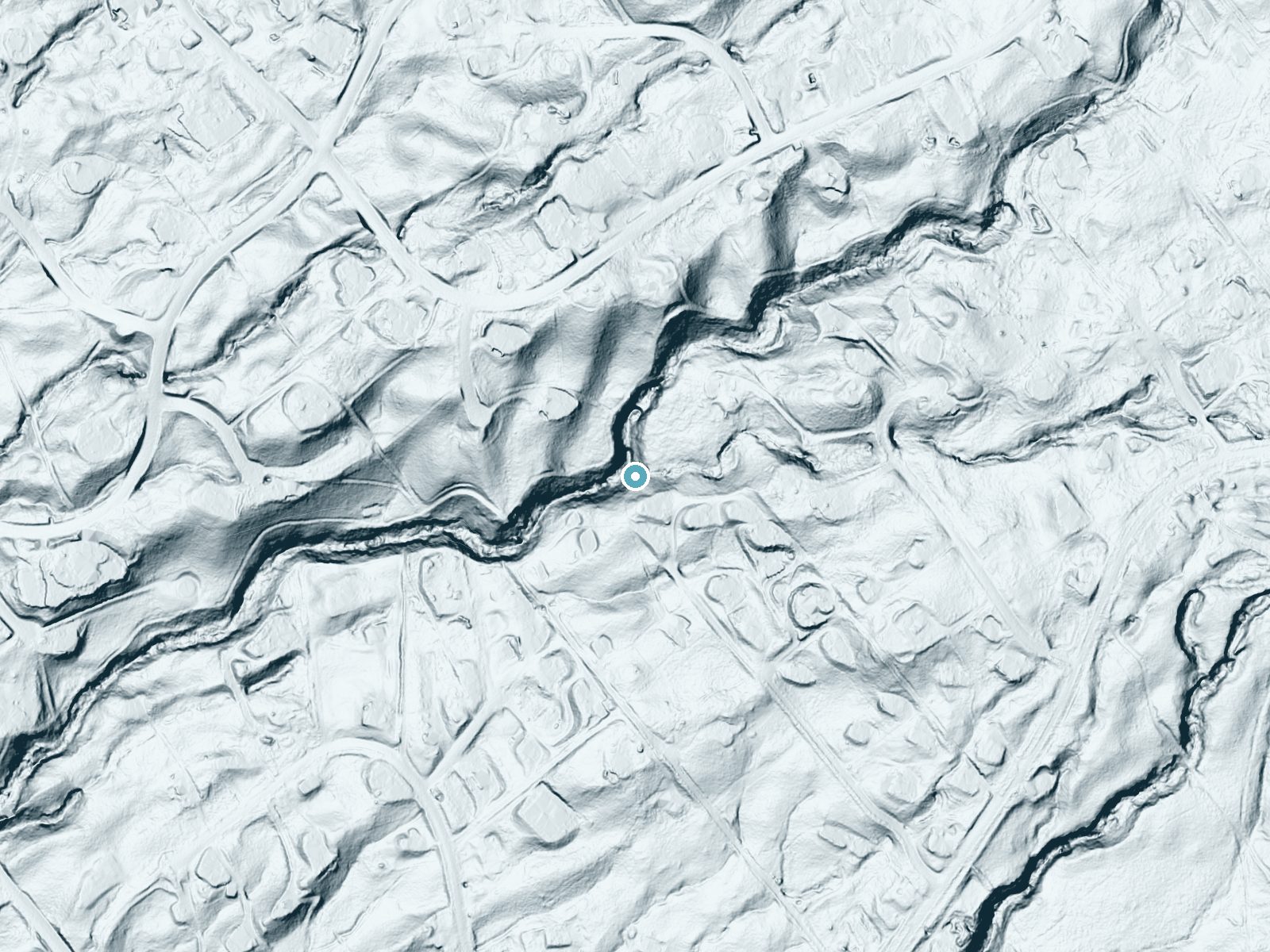 LiDAR bare-earth terrain around Waiokanalopaka Falls near Puako, Hawaii, showing about 106 feet of drop, a steep tiered drop, facing west