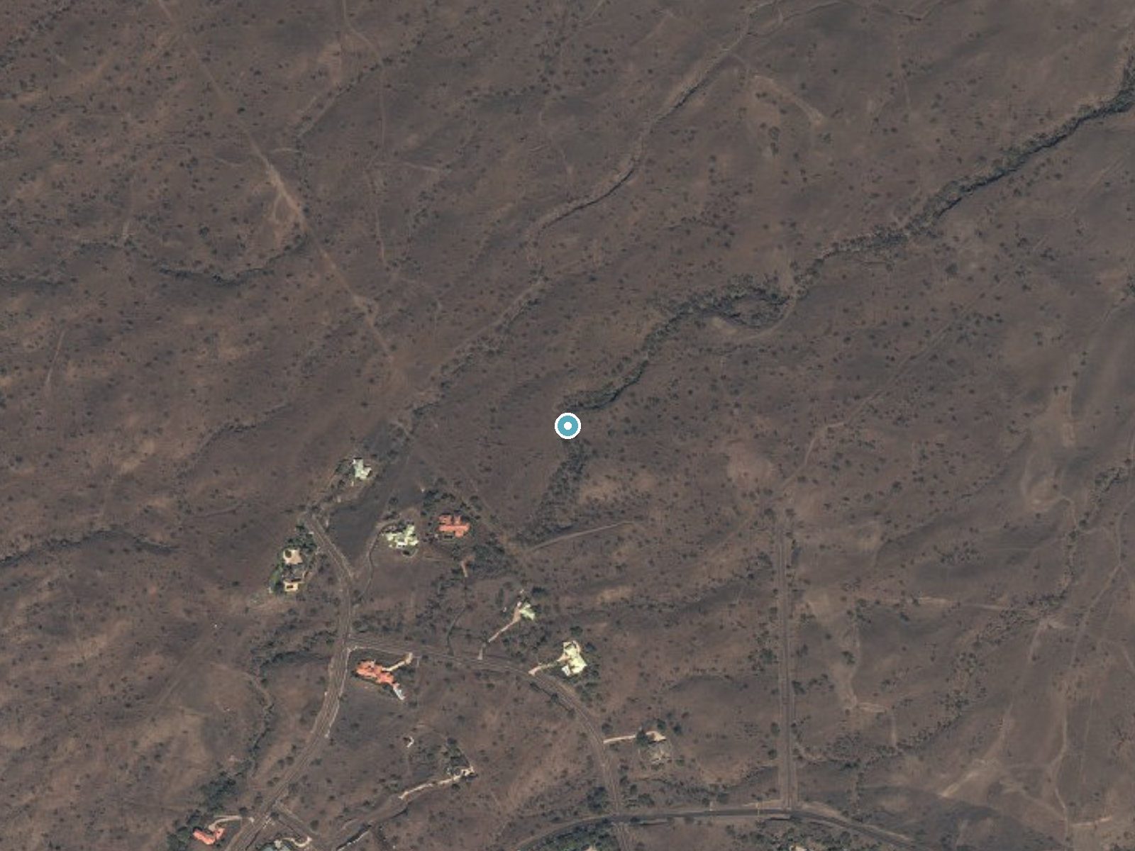 Aerial photo of the same ground around Keanapakulua Falls near Hawi, Hawaii, for comparison with the lidar view