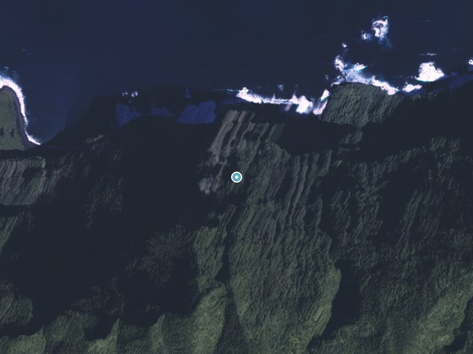 Aerial photo of the same ground around Hāloku Falls near Ualapue, Hawaii, for comparison with the lidar view