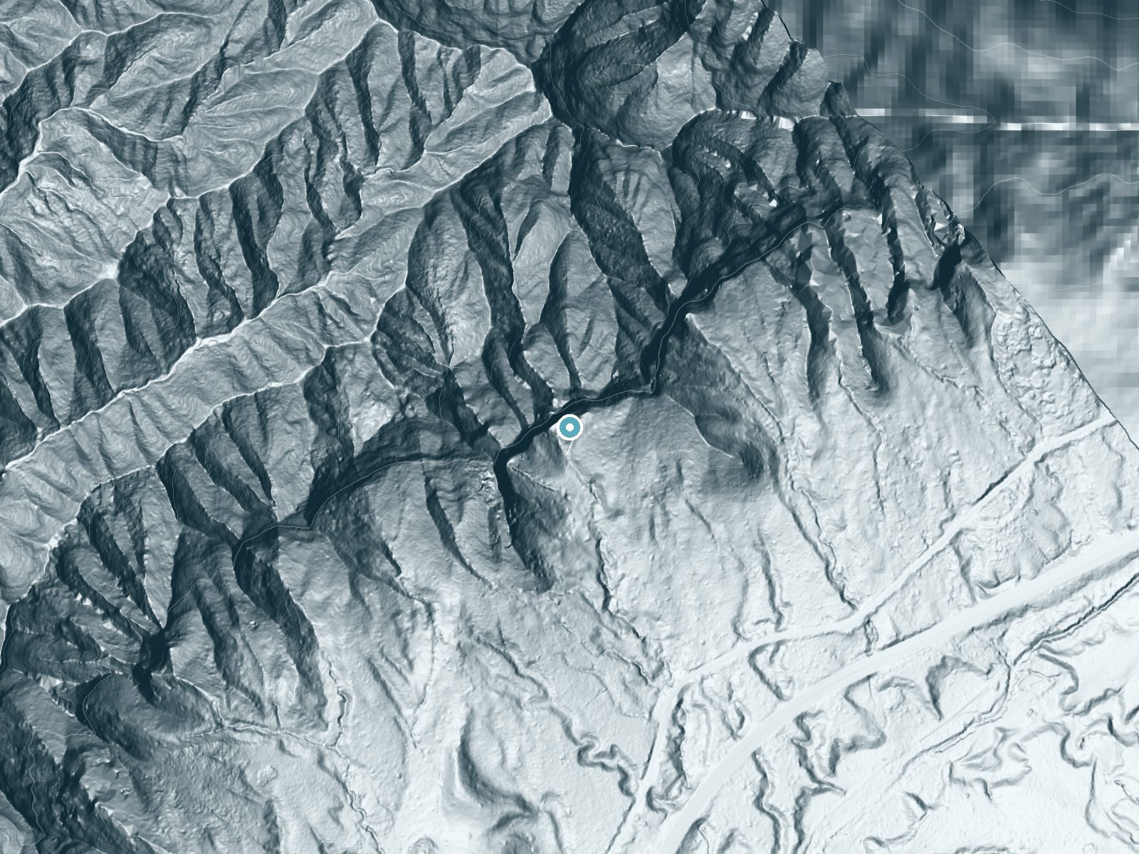 LiDAR bare-earth terrain around Waipuhia Falls near Maunawili, Hawaii, showing about 615 feet of drop, a single sheer drop, facing south