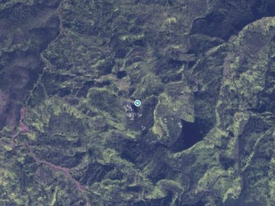 Aerial view around Kapaka Nui Falls in Hawaii