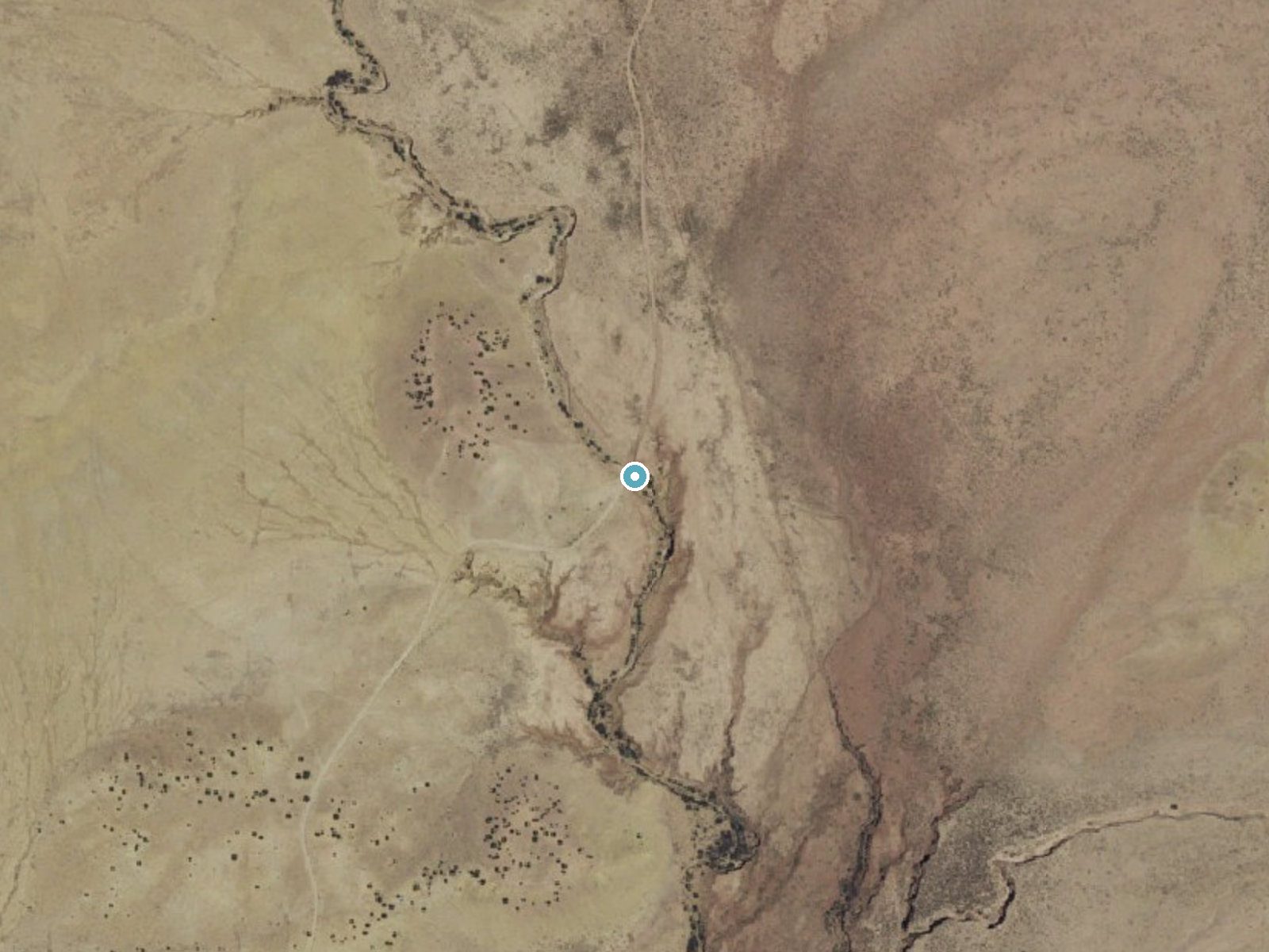 Aerial photo of the same ground around Chamisa Vega Spring Falls near San Luis, New Mexico, for comparison with the lidar view