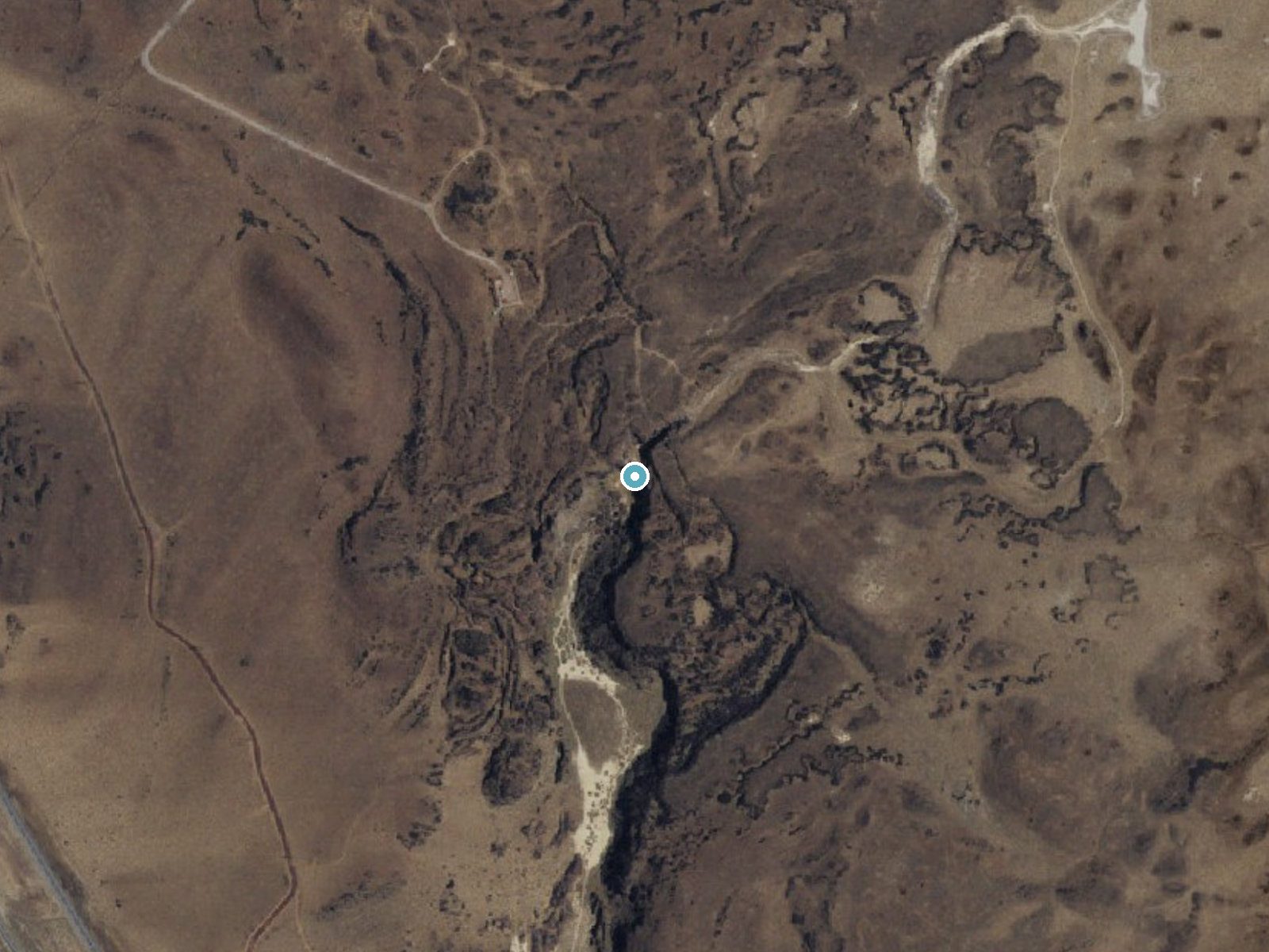 Aerial photo of the same ground around Fossil Falls near Kennedy Meadows, California, for comparison with the lidar view