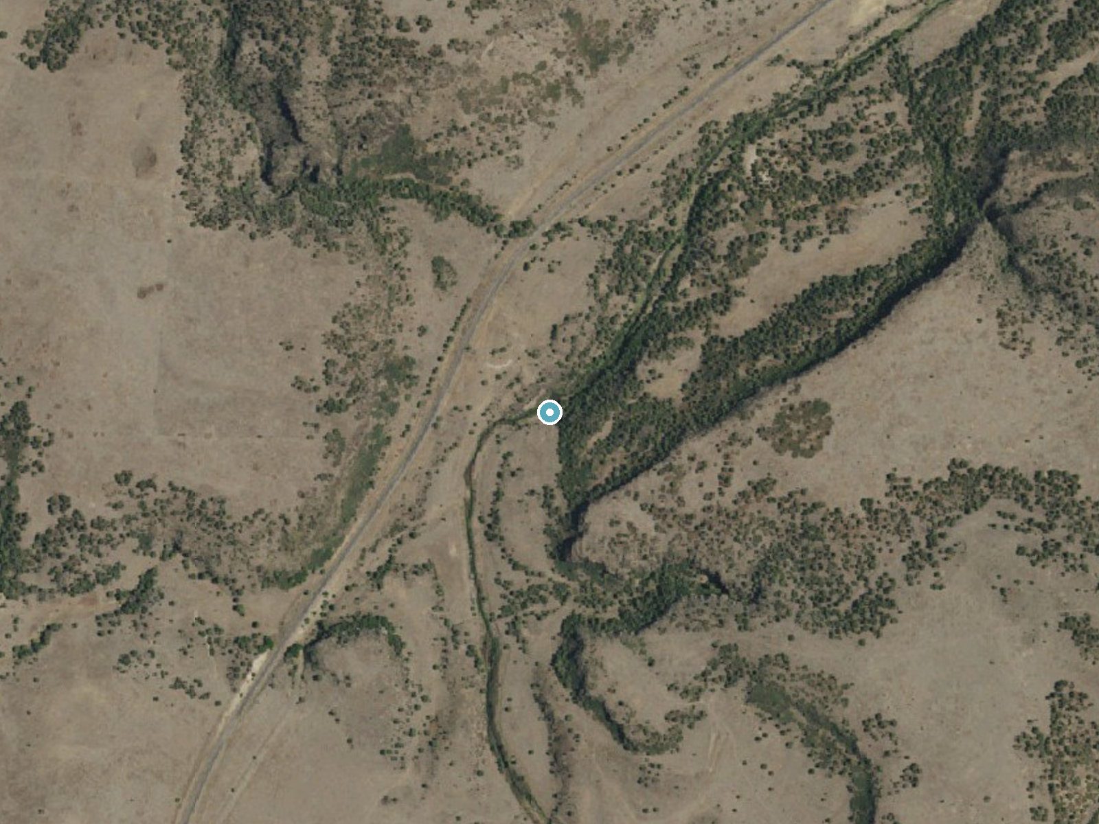 Aerial photo of the same ground around Folsom Falls near Folsom, New Mexico, for comparison with the lidar view