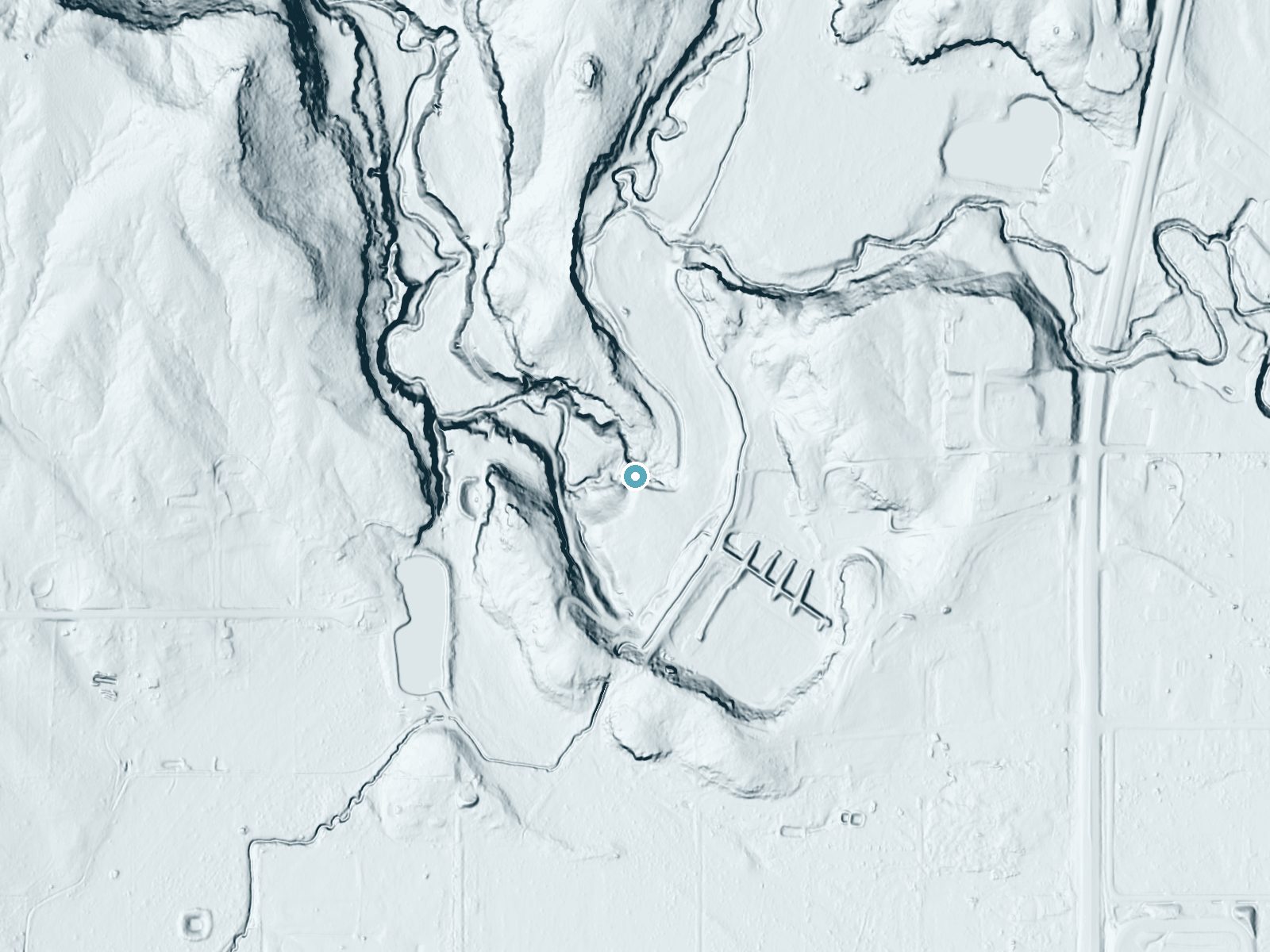 LiDAR bare-earth terrain around McElmo Falls near Cortez, Colorado, showing about 64 feet of drop, a steep tiered drop, facing west