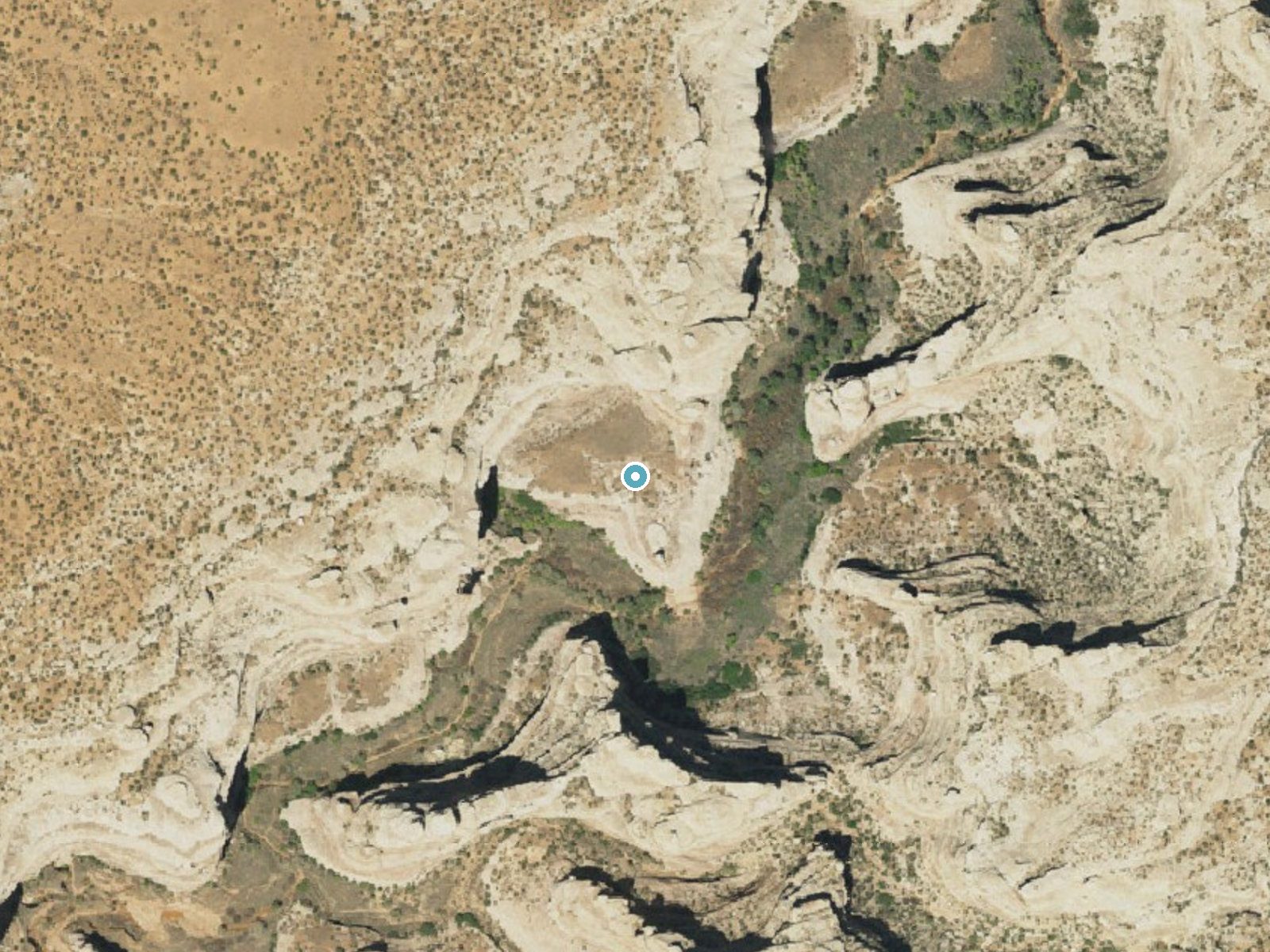 Aerial photo of the same ground around The Thumb Pour Off near Mexican Hat, Utah, for comparison with the lidar view
