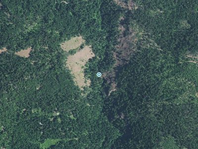 Aerial view around Marjorie Falls in Oregon