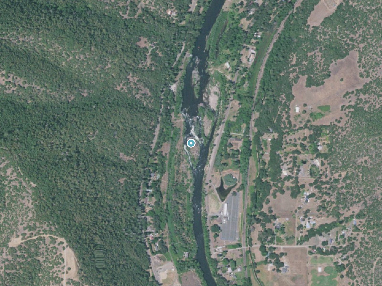 Aerial photo of the same ground around Ti'lomikh Falls near Gold Hill, Oregon, for comparison with the lidar view