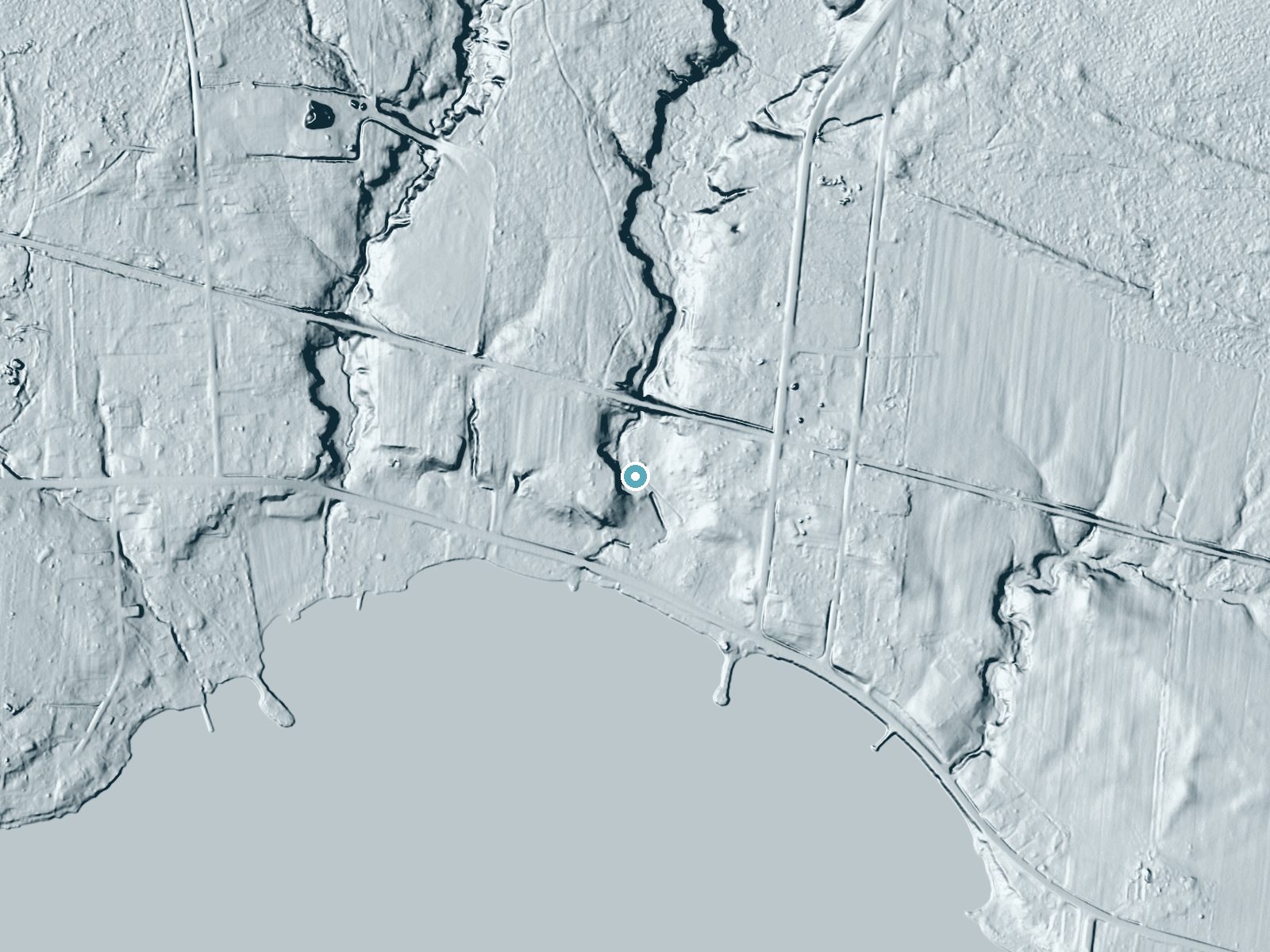 LiDAR bare-earth terrain around Winns Pond near Cleveland, New York, showing about 25 feet of drop, a long cascade, facing southeast