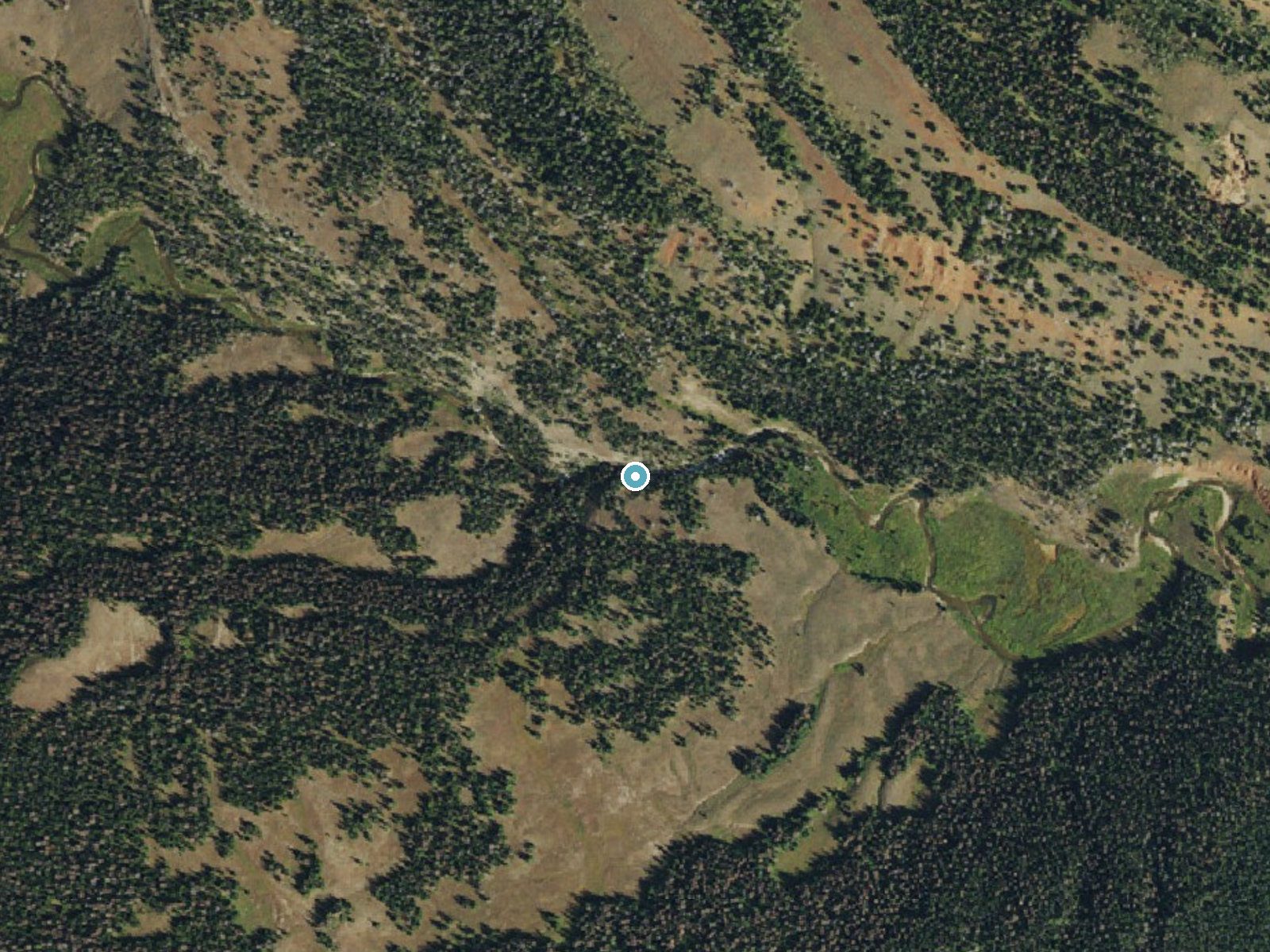Aerial photo of the same ground around Ouzel Falls near Bondurant, Wyoming, for comparison with the lidar view