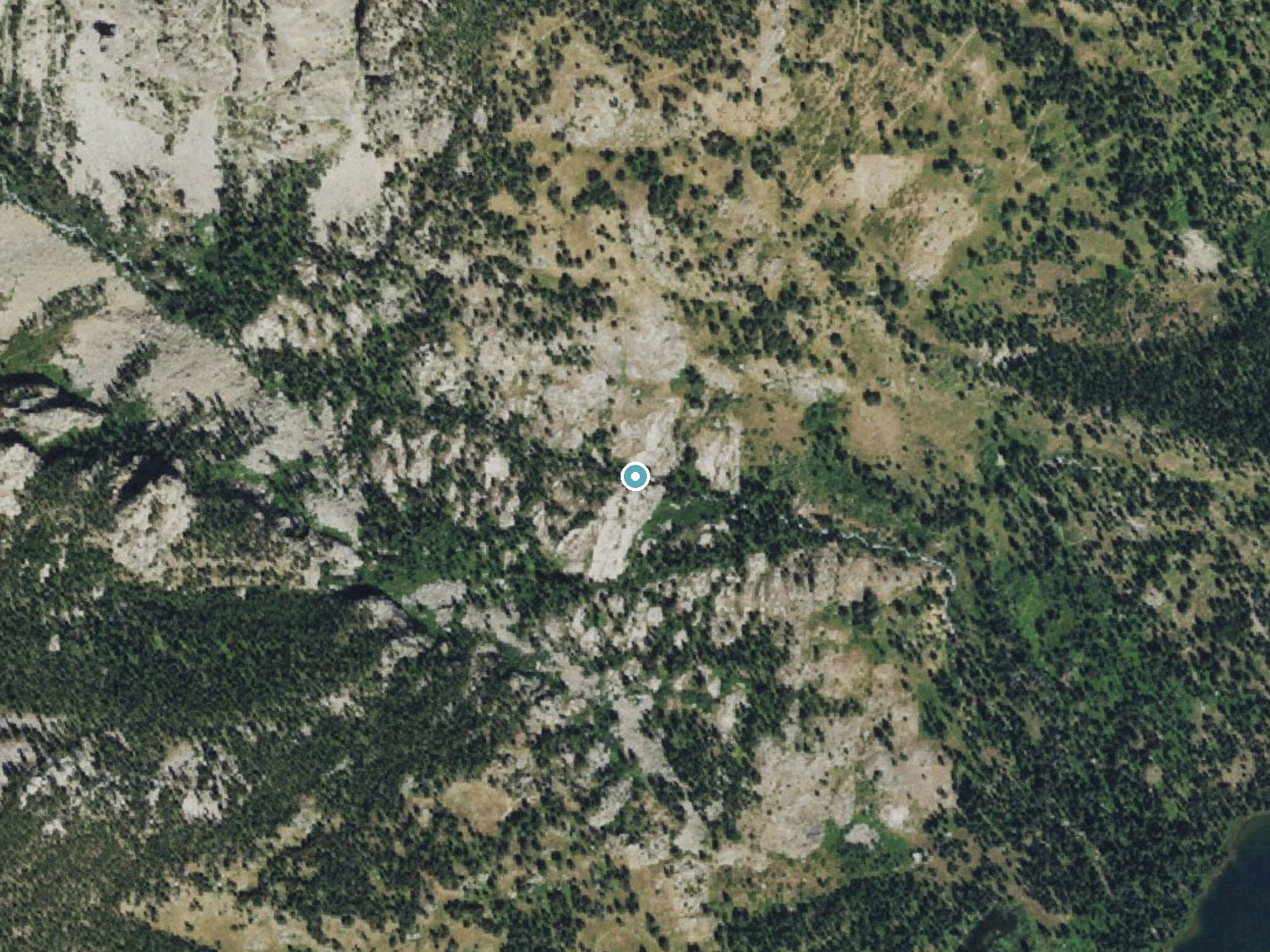 Aerial photo of the same ground around Bannock Falls near Teton Village, Wyoming, for comparison with the lidar view