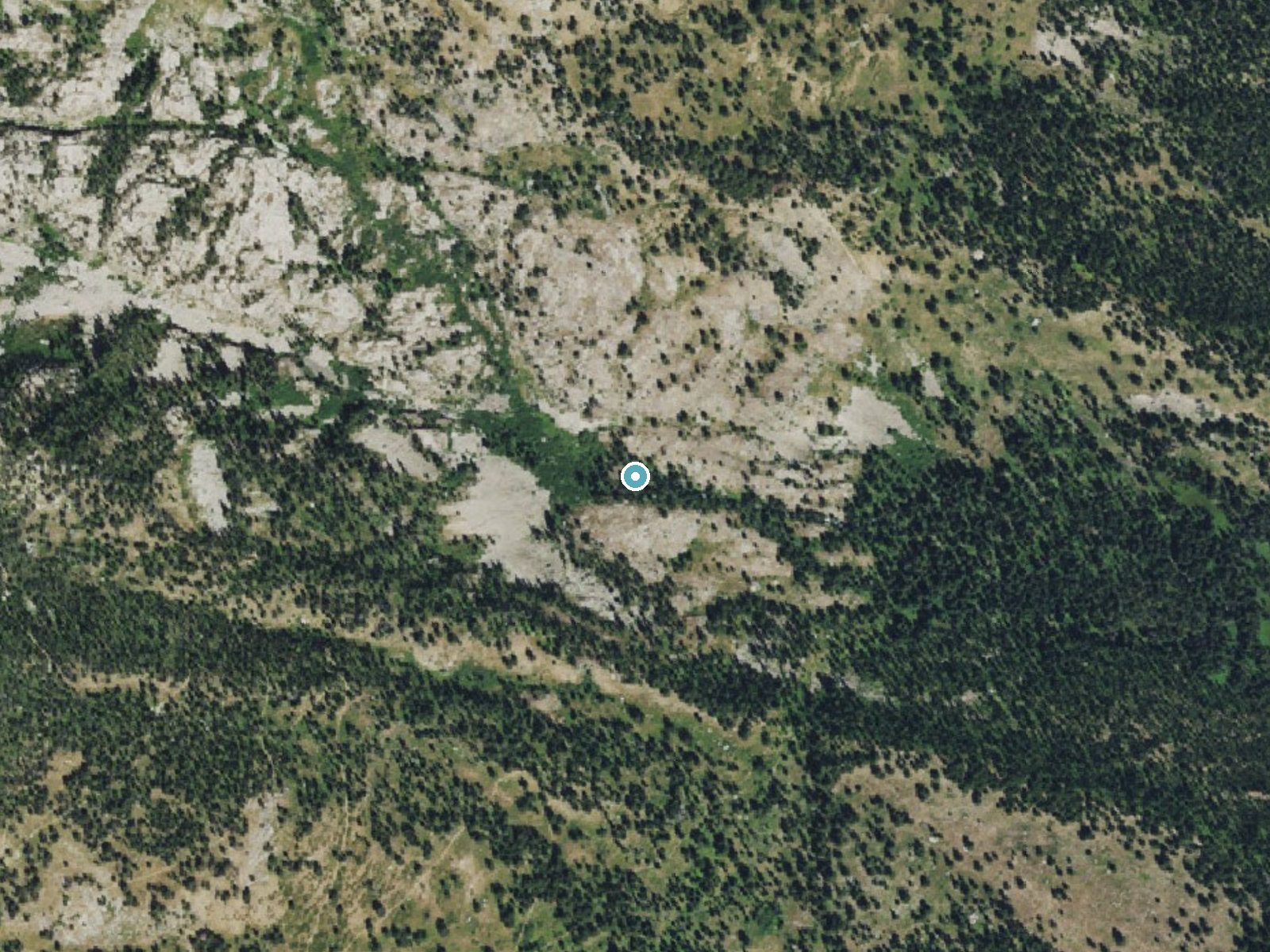 Aerial photo of the same ground around Glacier Falls near Teton Village, Wyoming, for comparison with the lidar view