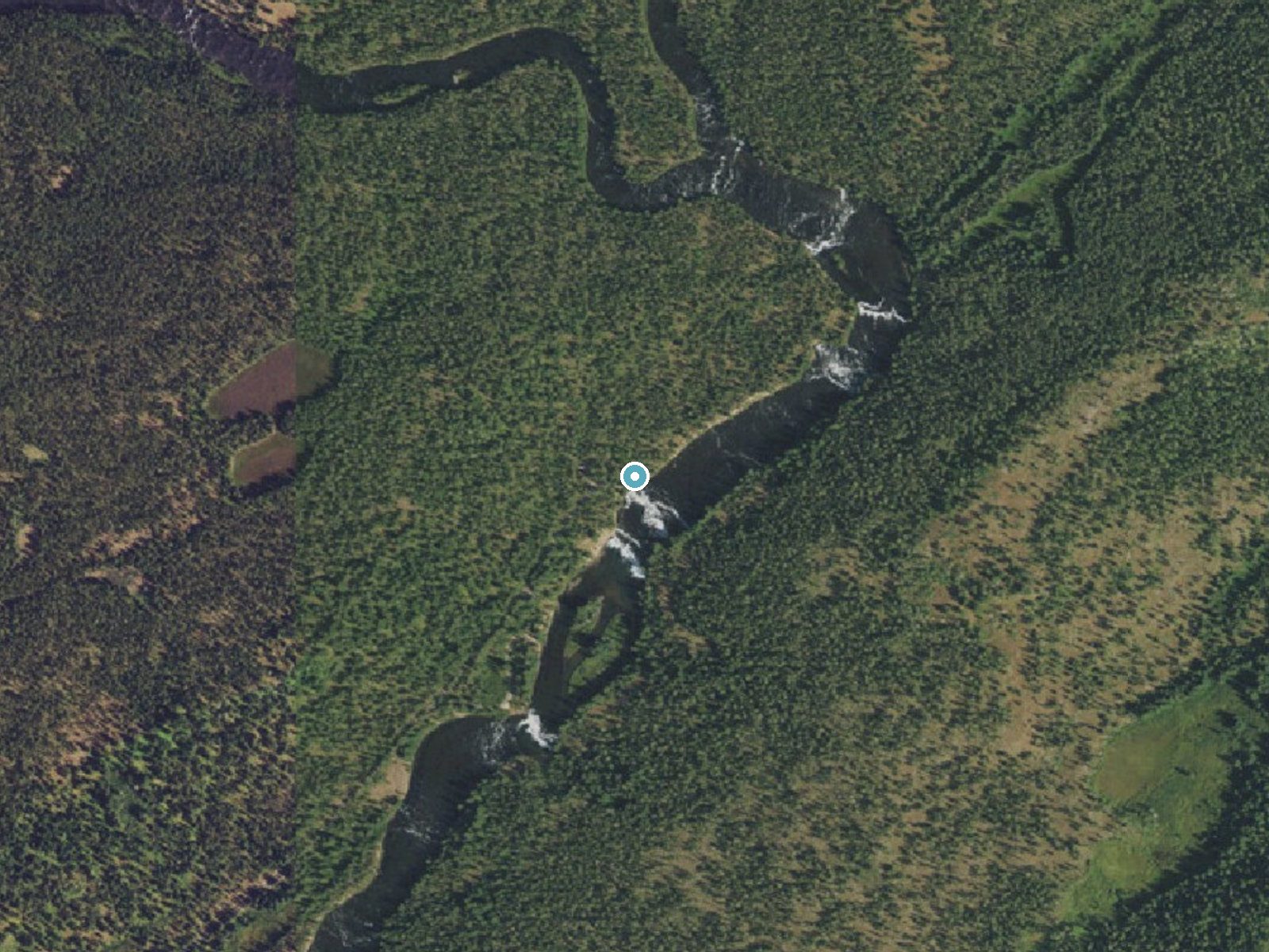 Aerial photo of the same ground around Cave Falls near Alta, Wyoming, for comparison with the lidar view
