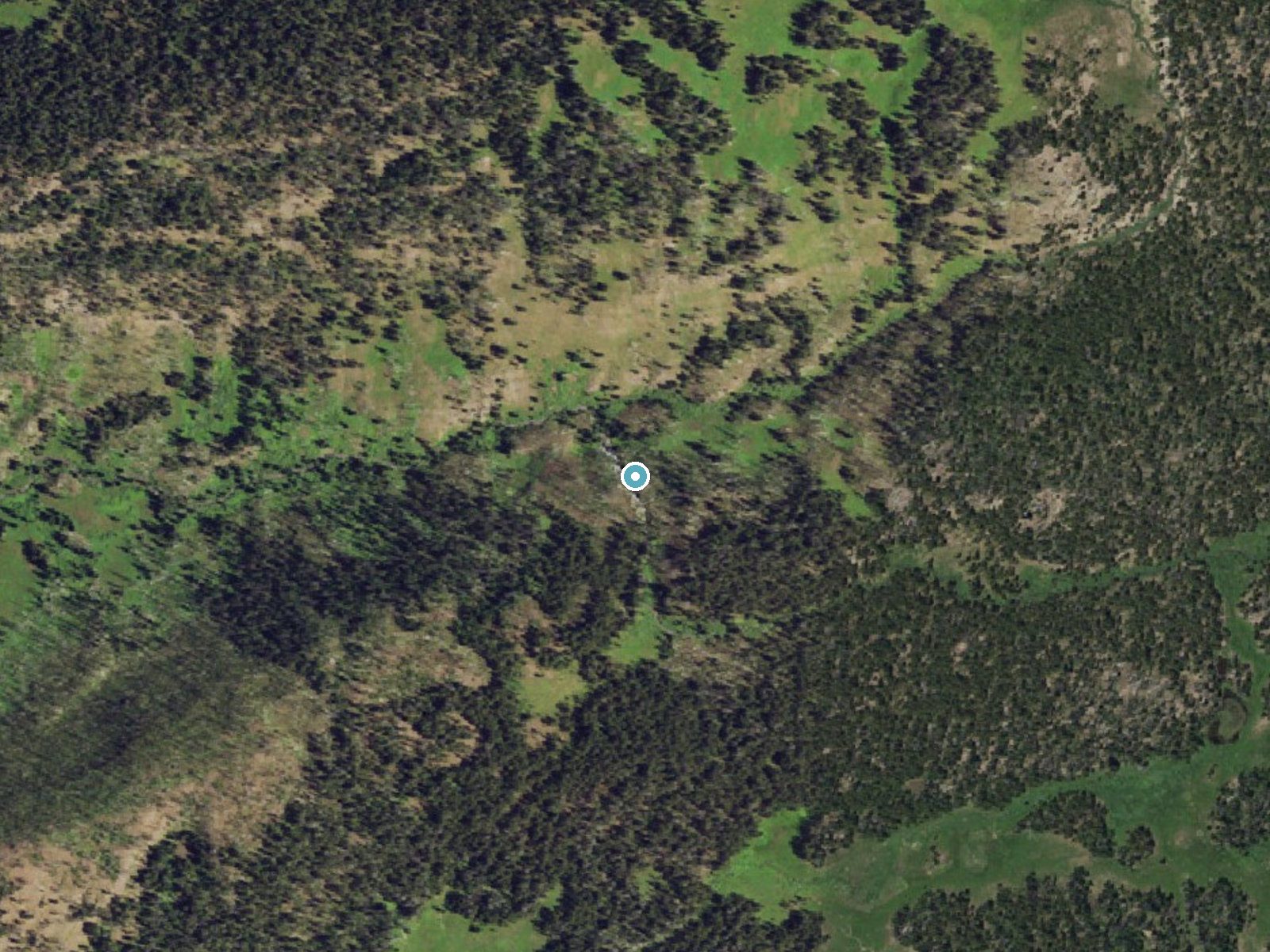 Aerial photo of the same ground around Plateau Falls near Kelly, Wyoming, for comparison with the lidar view