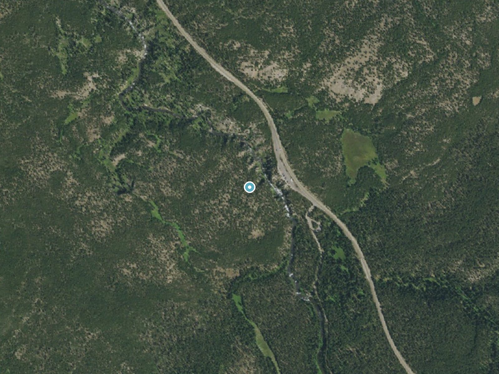Aerial photo of the same ground around Kepler Cascades near West Yellowstone, Wyoming, for comparison with the lidar view