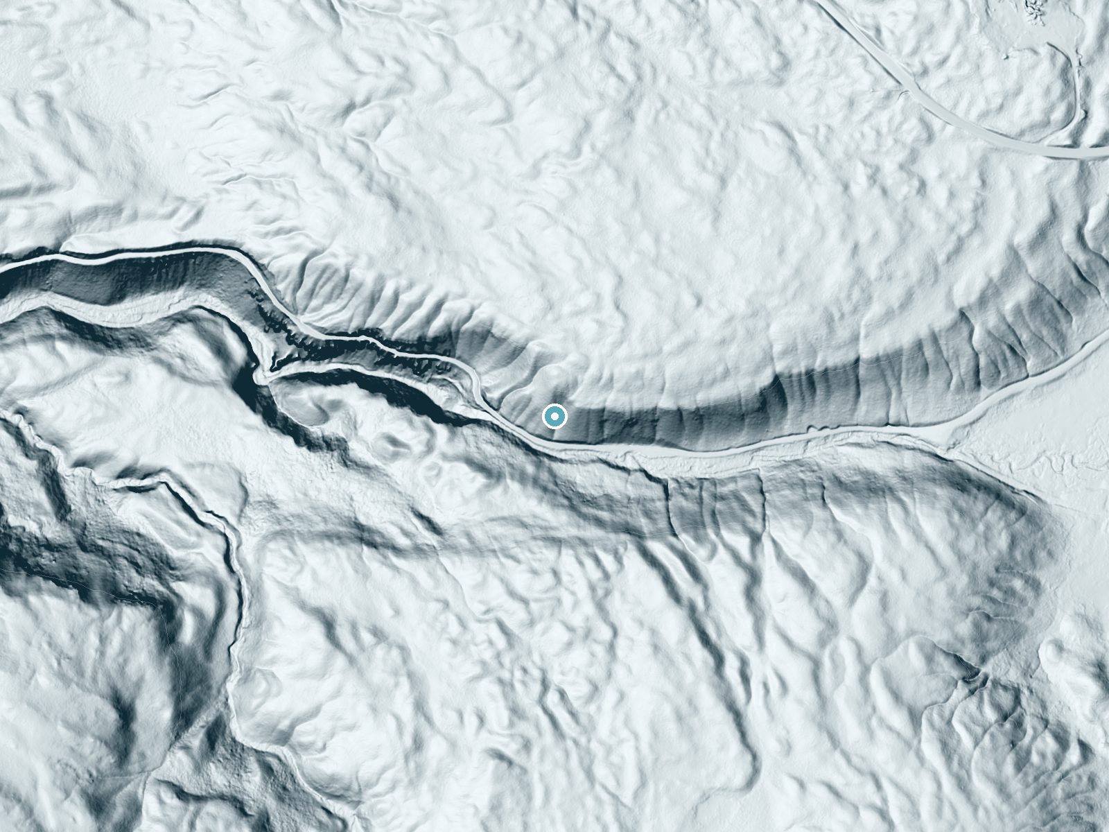 LiDAR bare-earth terrain around Virginia Cascade near Mammoth, Wyoming, showing about 140 feet of drop, a steep tiered drop, facing south