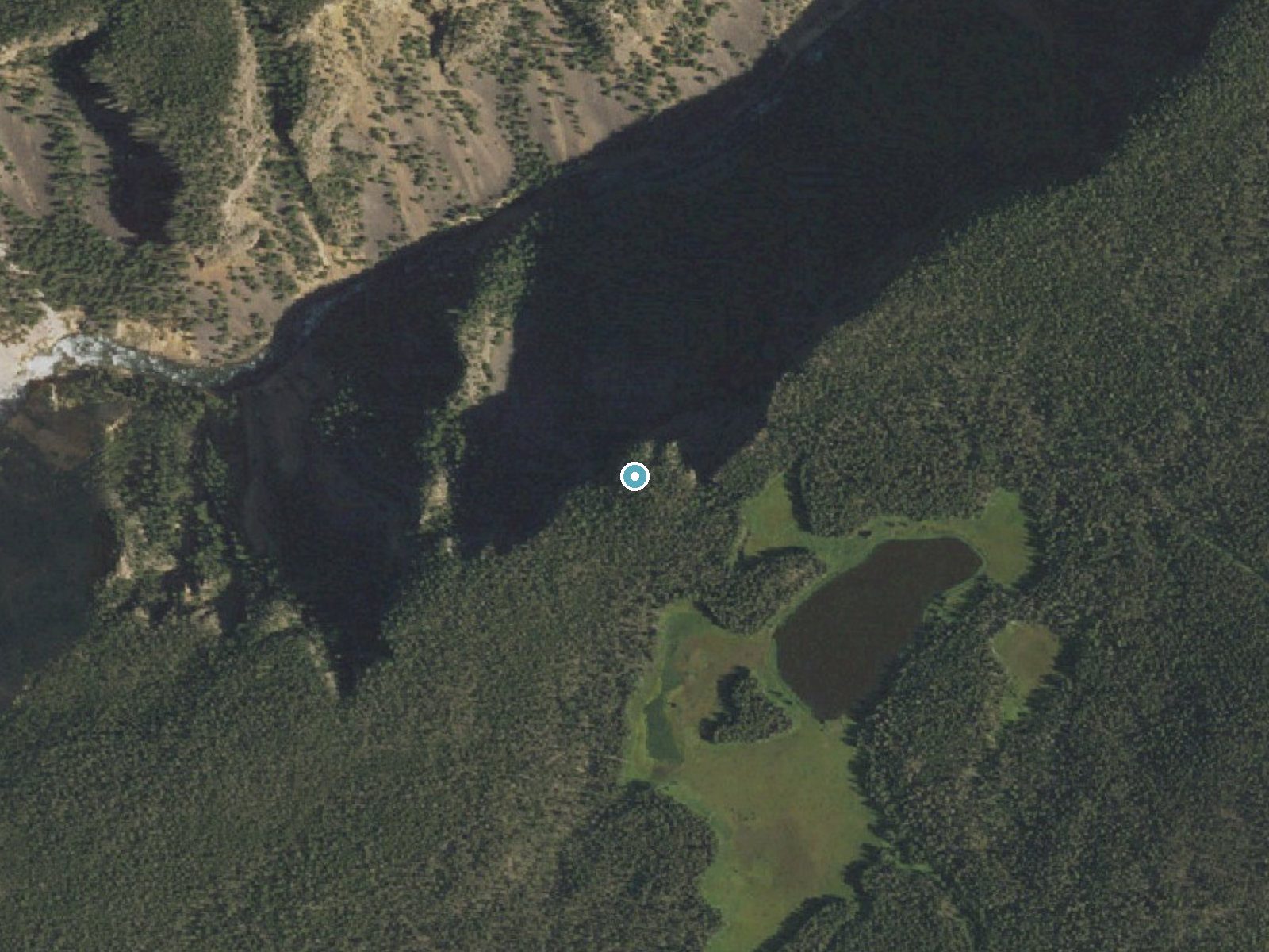 Aerial photo of the same ground around Silver Cord Cascade near Mammoth, Wyoming, for comparison with the lidar view