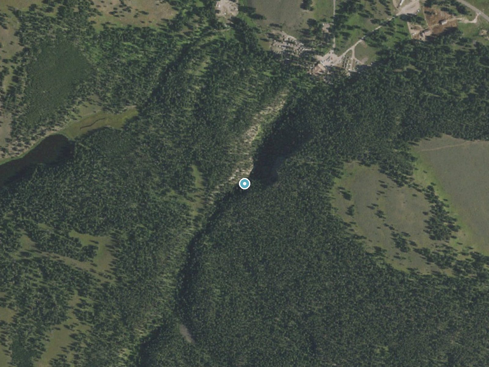 Aerial photo of the same ground around Lost Creek Falls near Mammoth, Wyoming, for comparison with the lidar view