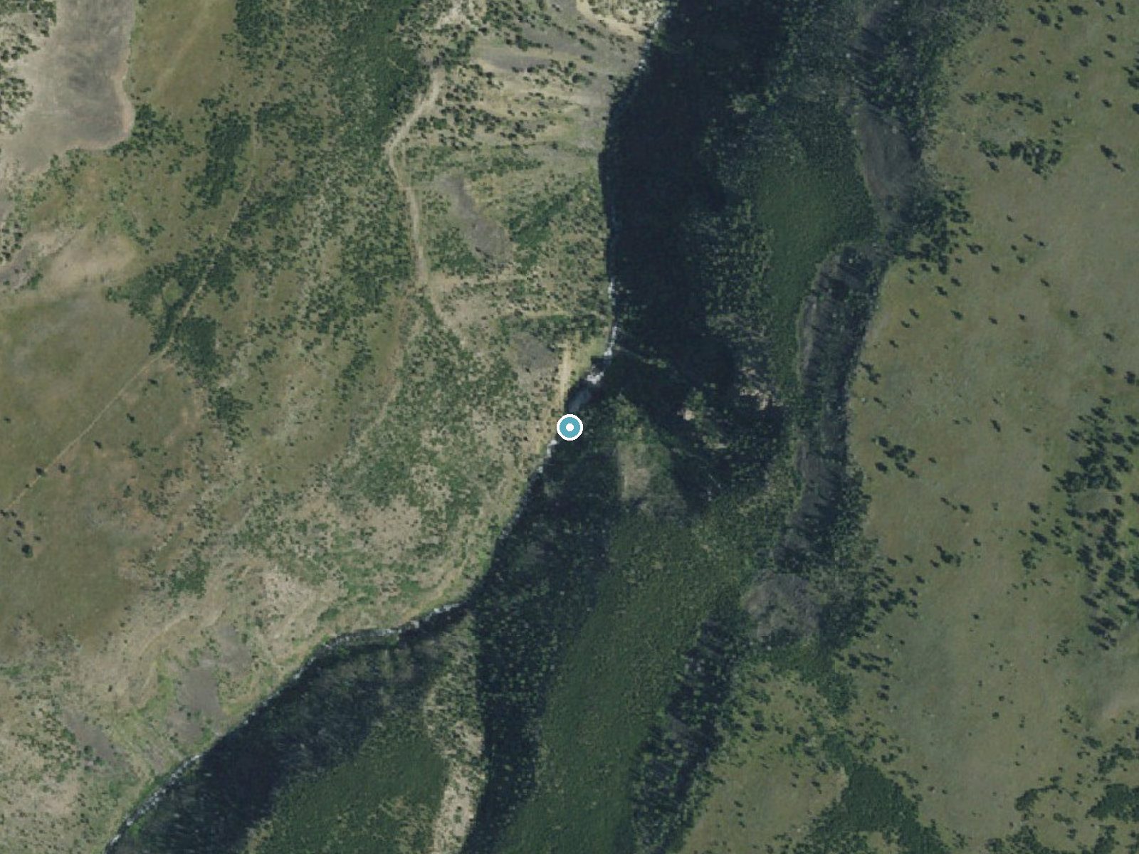 Aerial photo of the same ground around Osprey Falls near Mammoth, Wyoming, for comparison with the lidar view