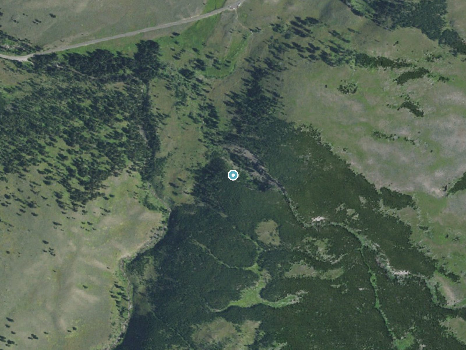 Aerial photo of the same ground around Wraith Falls near Mammoth, Wyoming, for comparison with the lidar view