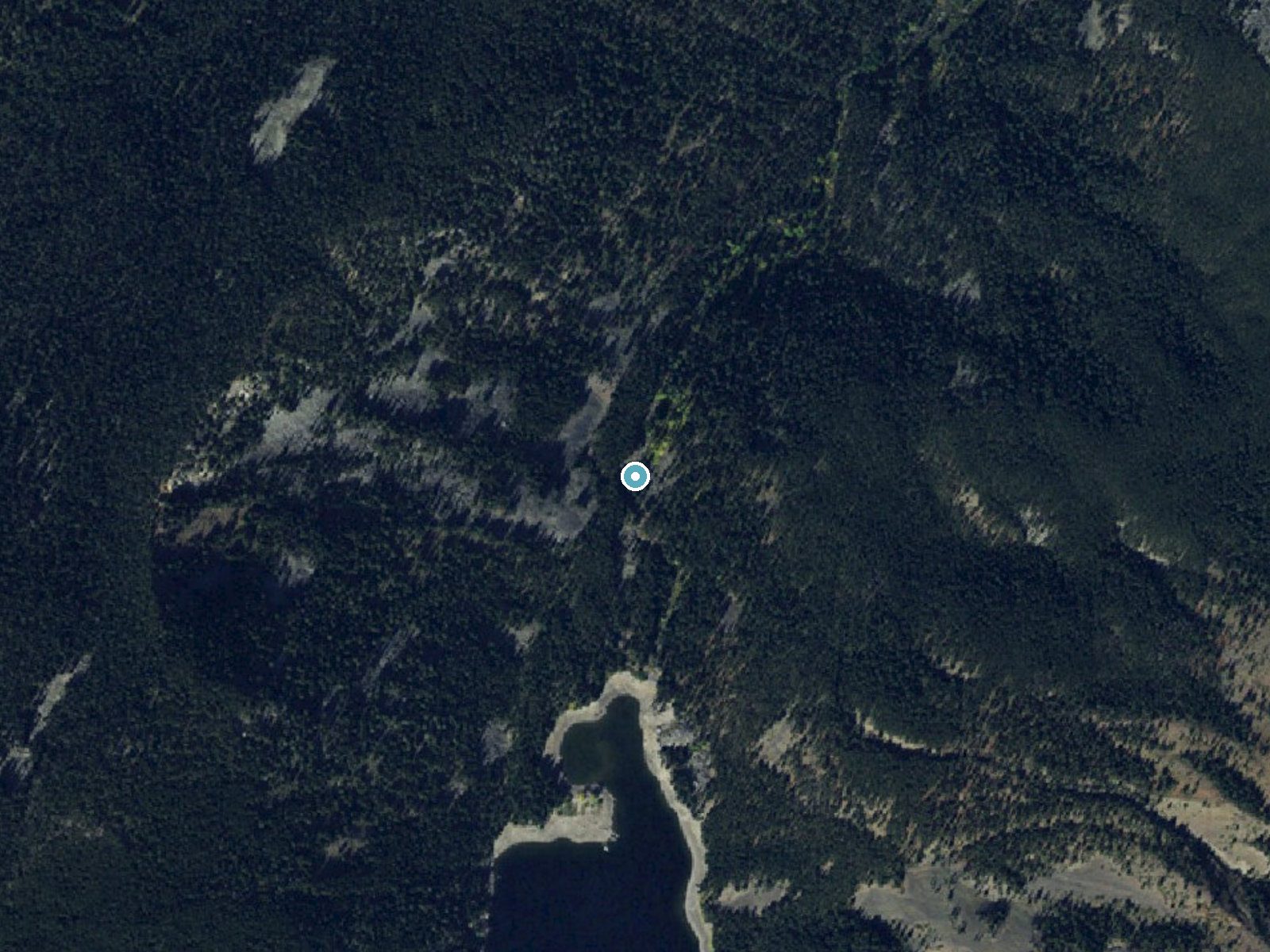 Aerial photo of the same ground around Hoodoo Cascade near Big Sky, Montana, for comparison with the lidar view