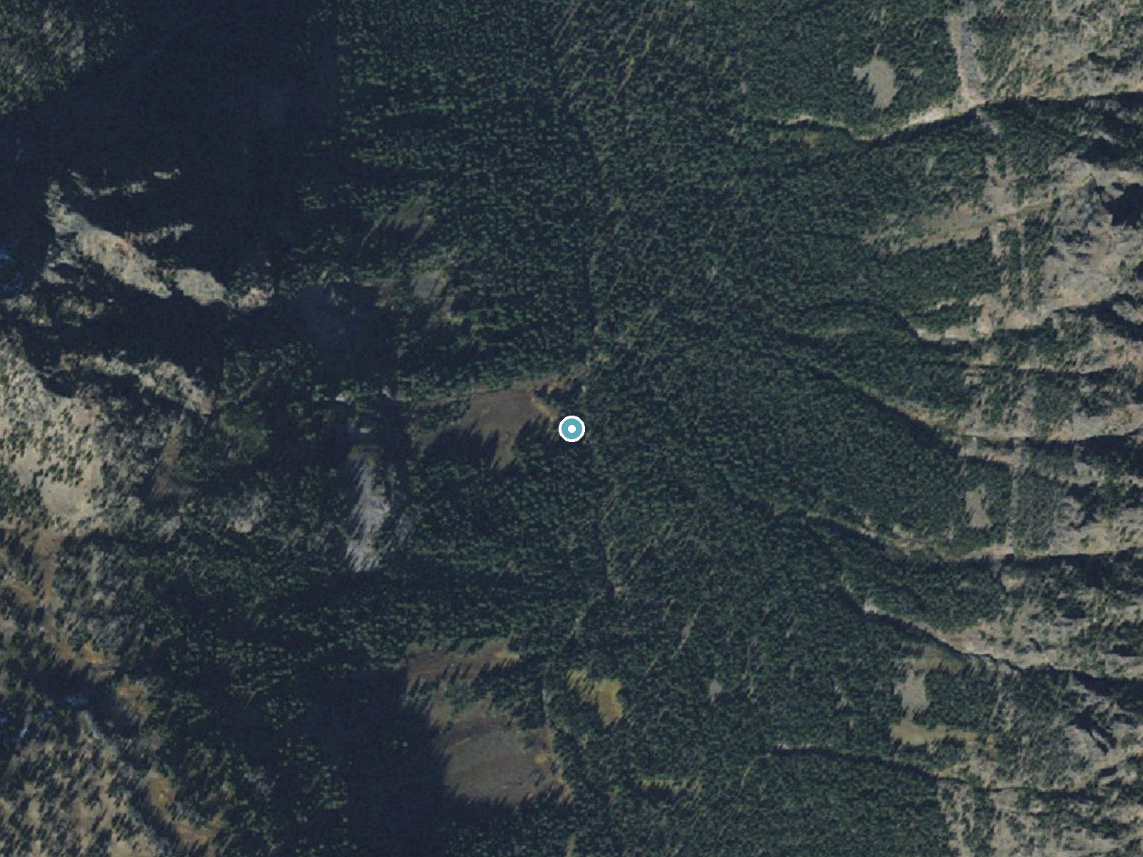 Aerial photo of the same ground around Champagne Falls near Emigrant, Montana, for comparison with the lidar view