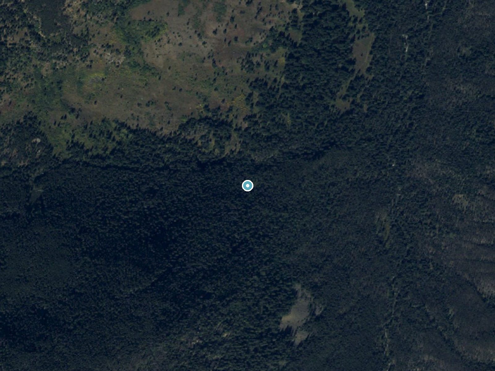 Aerial photo of the same ground around Pioneer Falls near Big Sky, Montana, for comparison with the lidar view