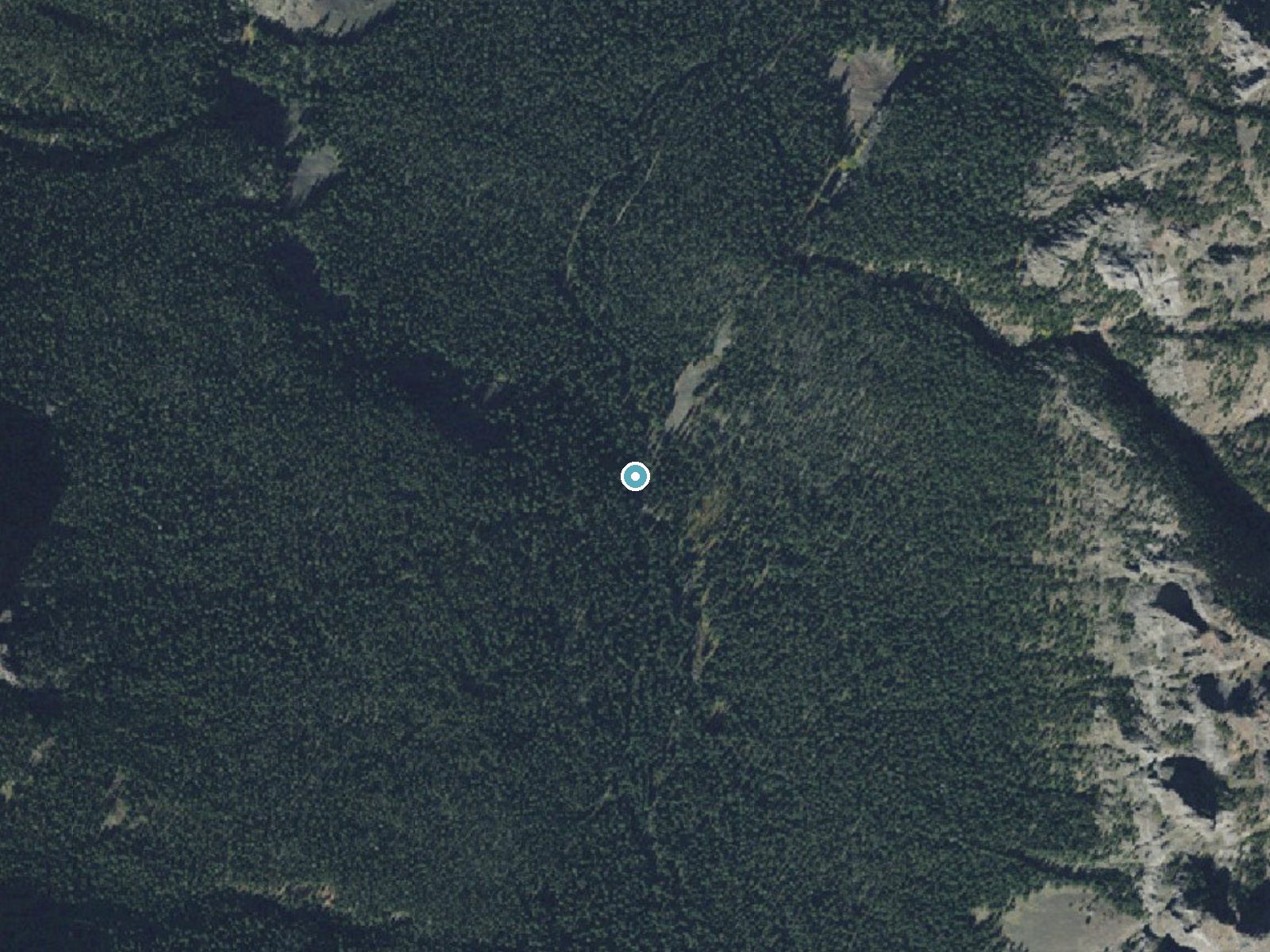 Aerial photo of the same ground around Grotto Falls near Emigrant, Montana, for comparison with the lidar view