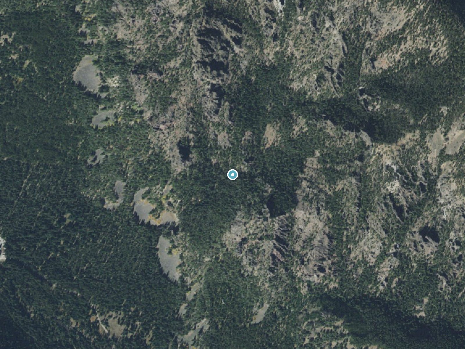 Aerial photo of the same ground around Palisades Falls near Emigrant, Montana, for comparison with the lidar view
