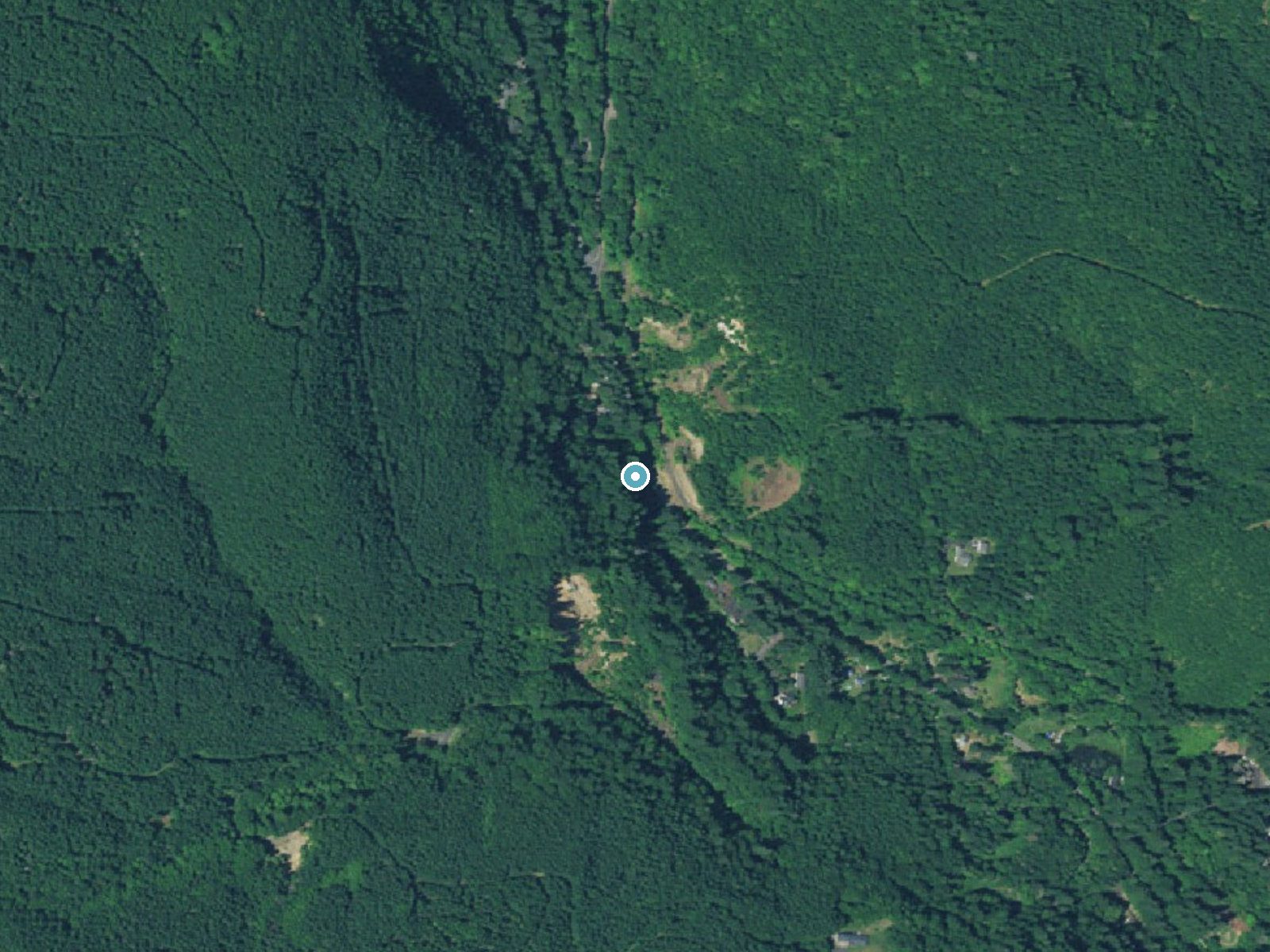 Aerial view of the ground around Bonnie Falls near Warren, Oregon