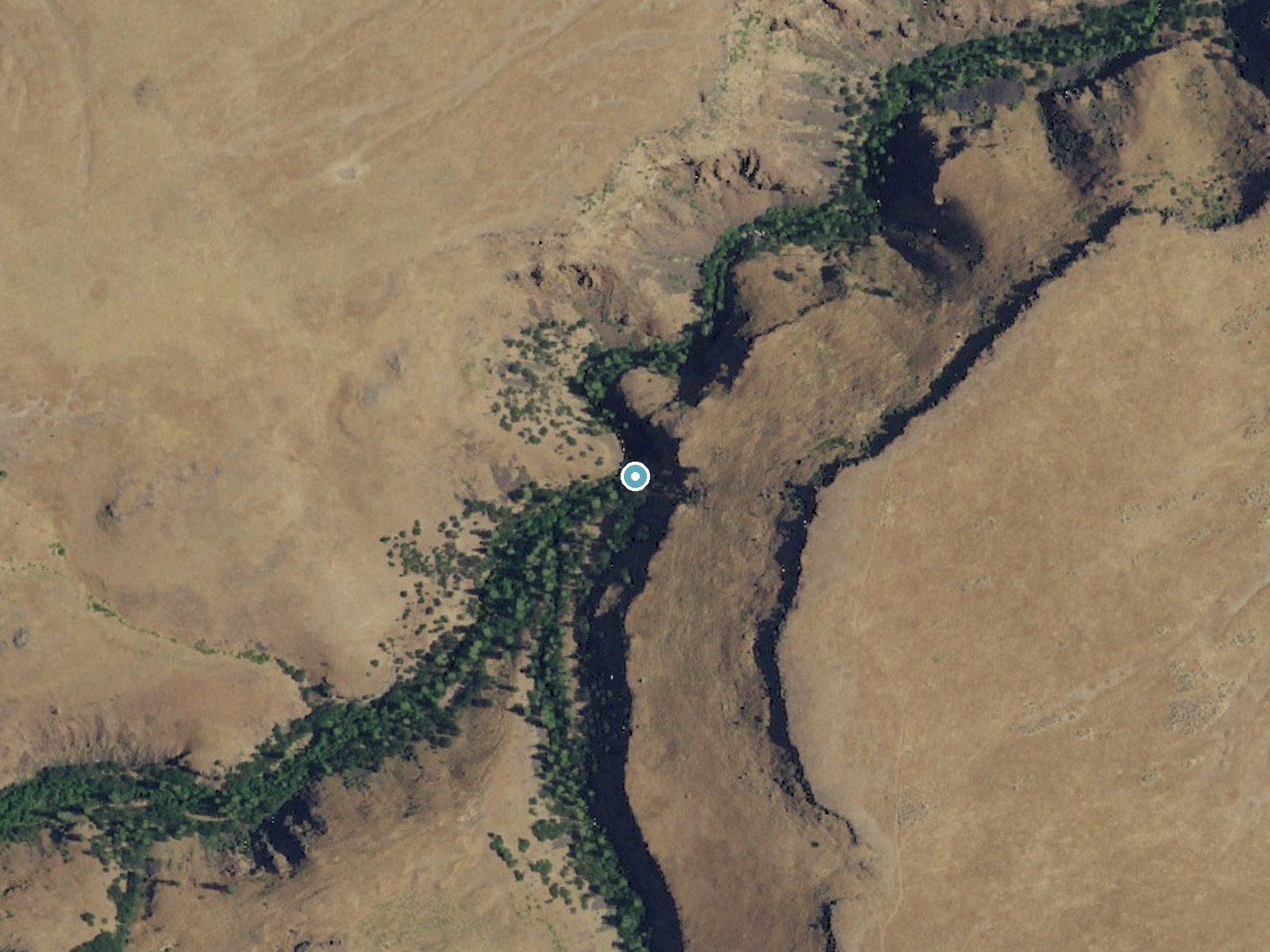Aerial view of the ground around Logy Creek Falls near White Swan, Washington