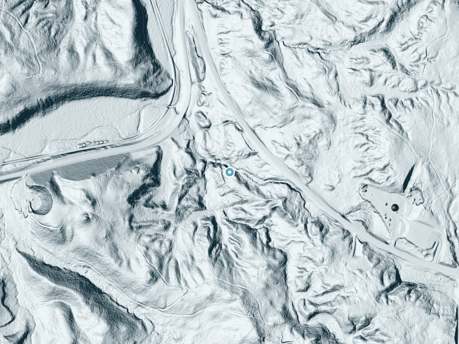 LiDAR bare-earth terrain around Wagner Falls near Munising, Michigan, showing about 87 feet of drop, a long cascade, facing west
