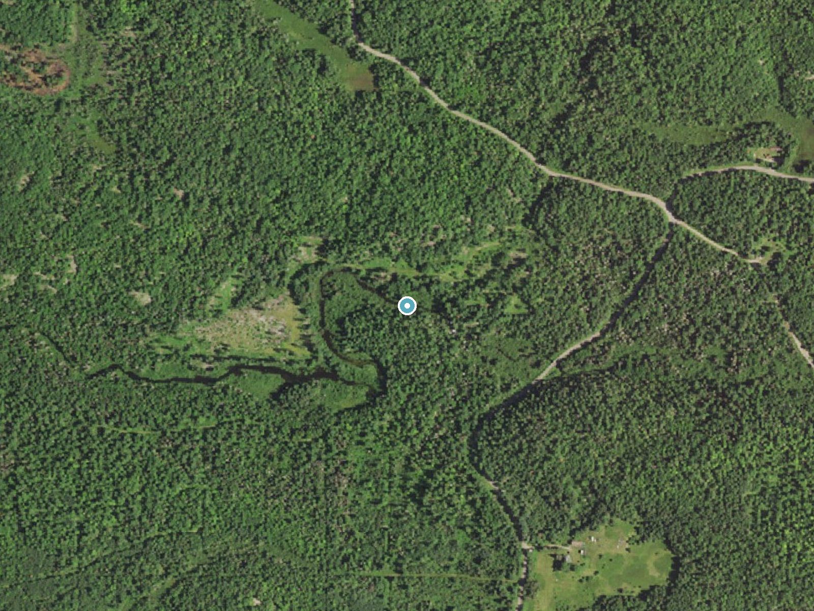 Aerial photo of the same ground around Schweitzer Falls near Palmer, Michigan, for comparison with the lidar view