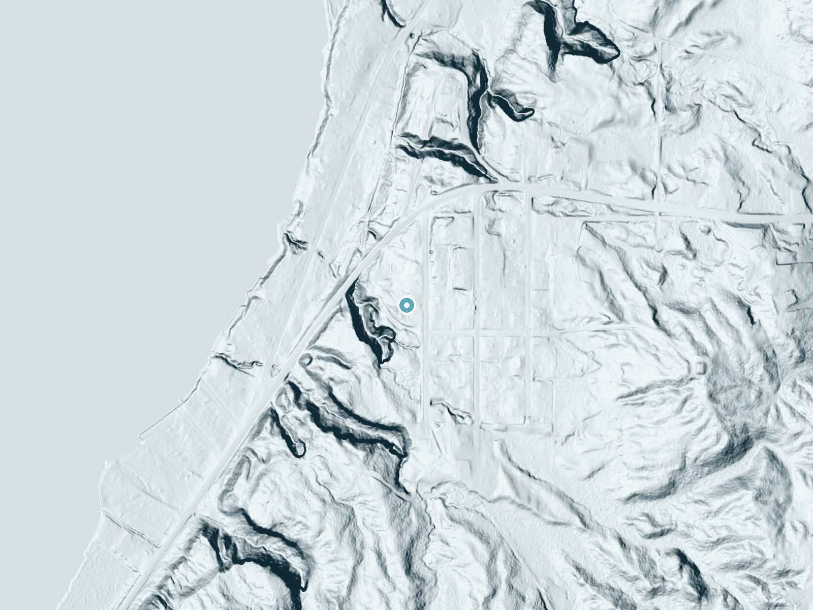 LiDAR bare-earth terrain around Memorial Falls near Munising, Michigan, showing about 72 feet of drop, a long cascade, facing west