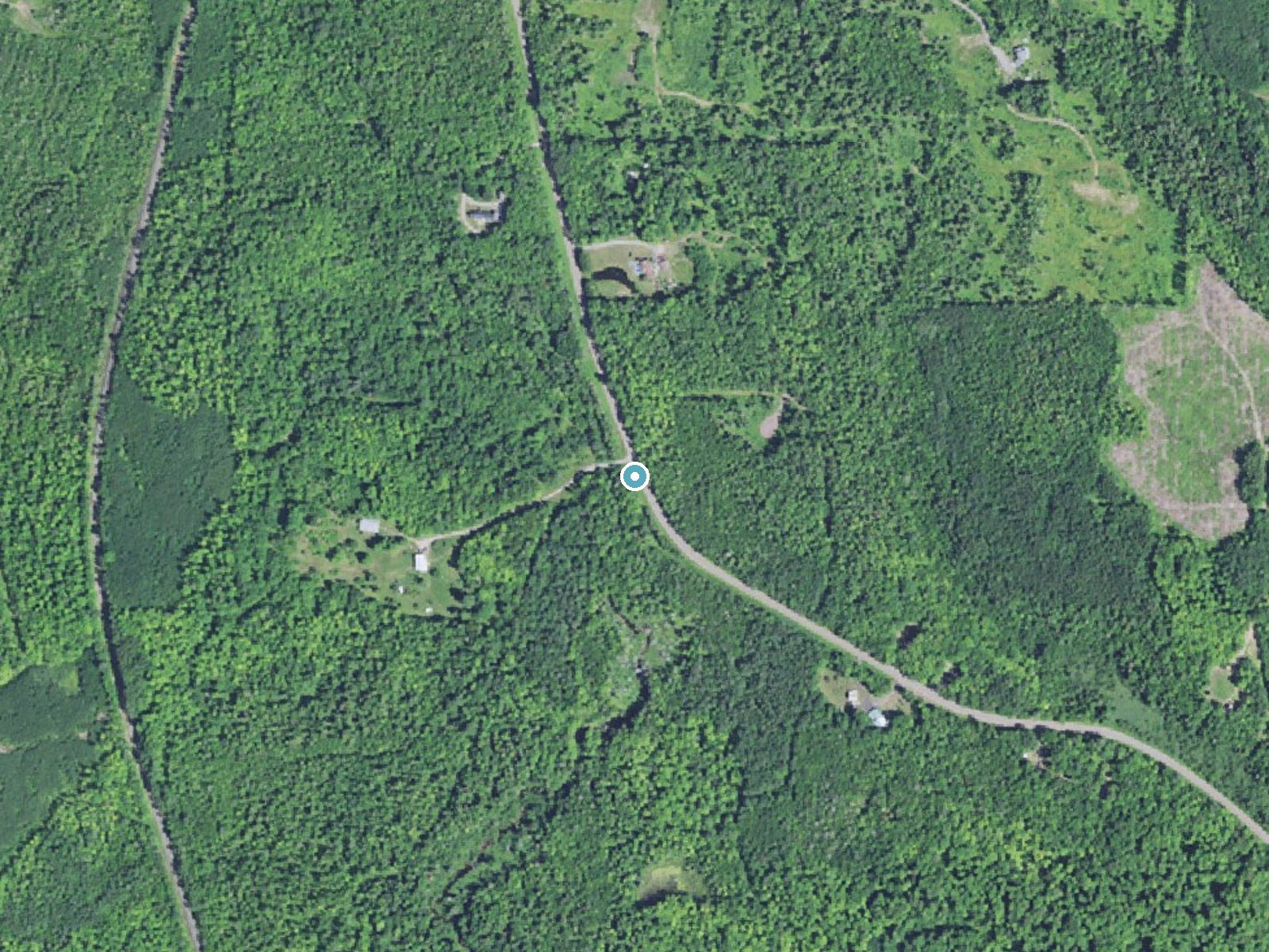 Aerial view of the ground around Daults Falls near L'Anse, Michigan