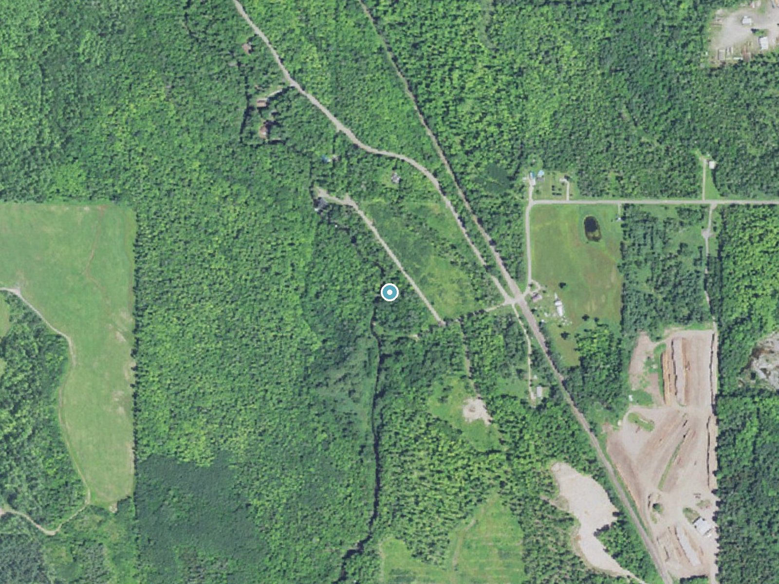 Aerial view of the ground around Power Dam Falls near L'Anse, Michigan