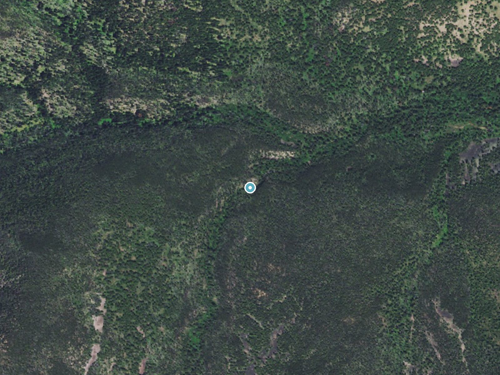 Aerial photo of the same ground around Paradise Falls near Marysville, Montana, for comparison with the lidar view
