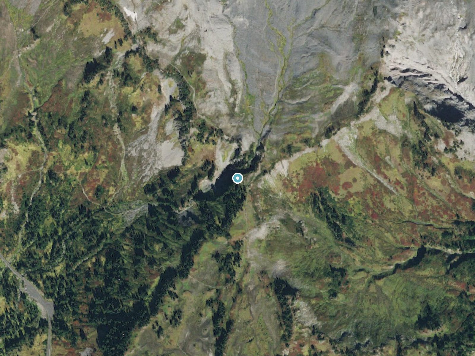 Aerial photo of the same ground around Sluiskin Falls near Packwood, Washington, for comparison with the lidar view
