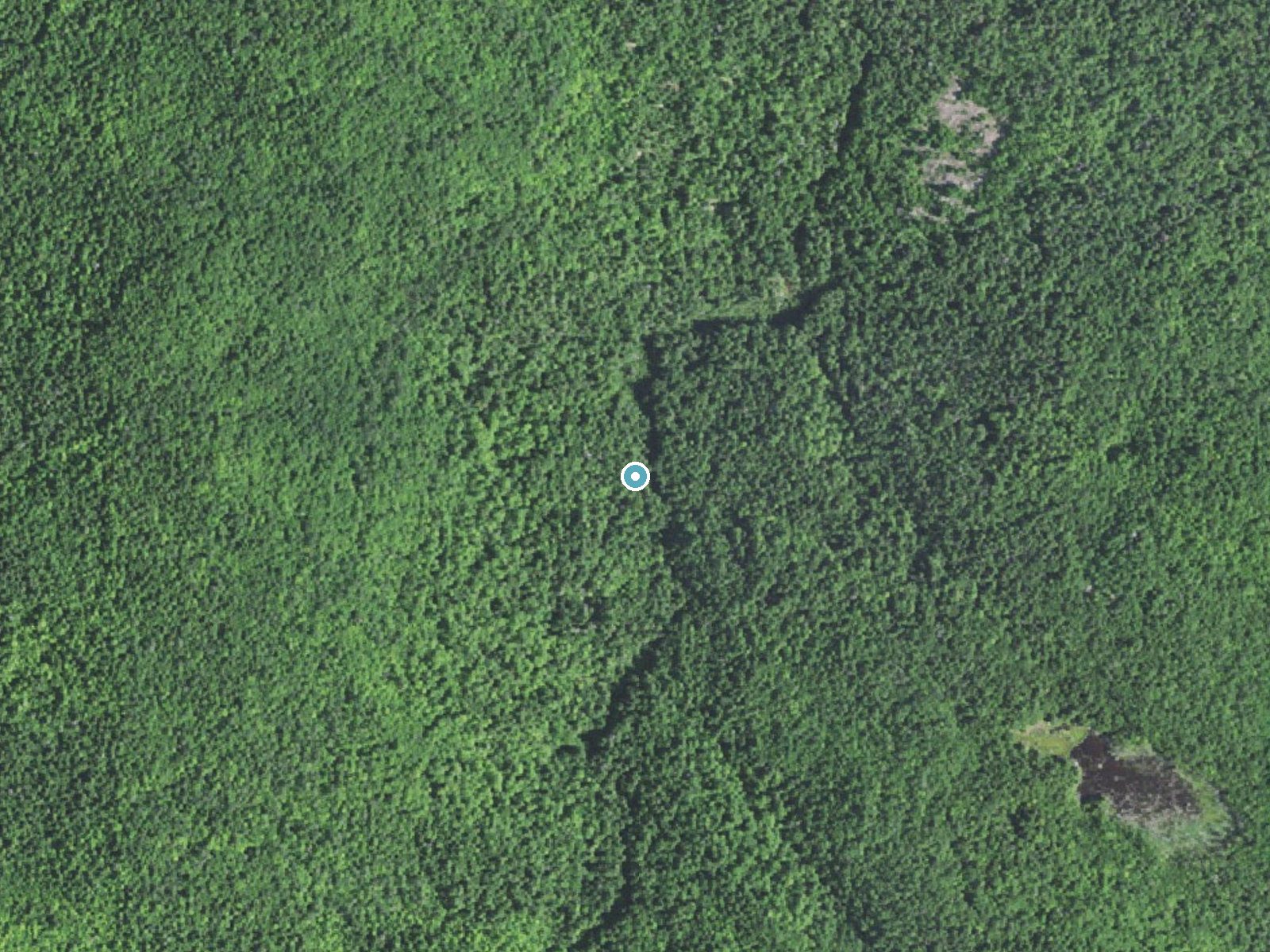 Aerial photo of the same ground around Turkey Neck Falls near Big Bay, Michigan, for comparison with the lidar view