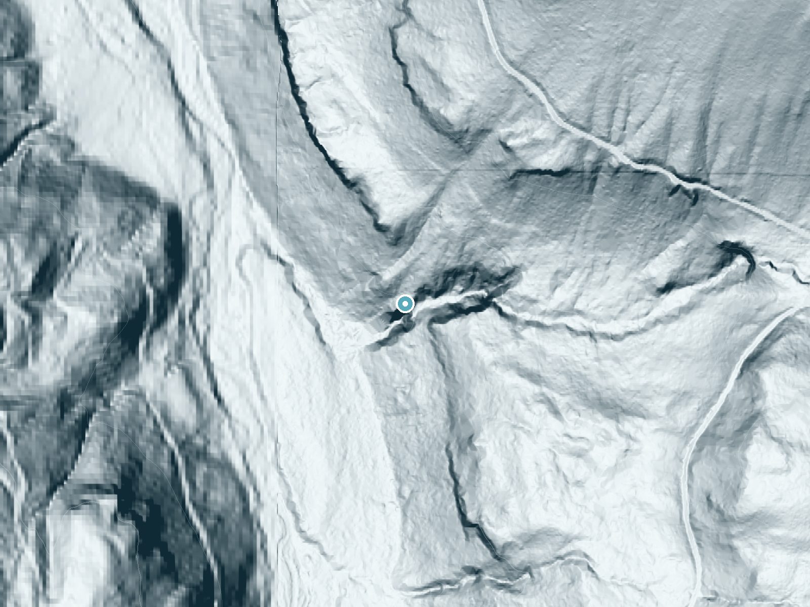 LiDAR bare-earth terrain around Ethania Falls near Ashford, Washington, showing about 323 feet of drop, a steep tiered drop, facing southwest