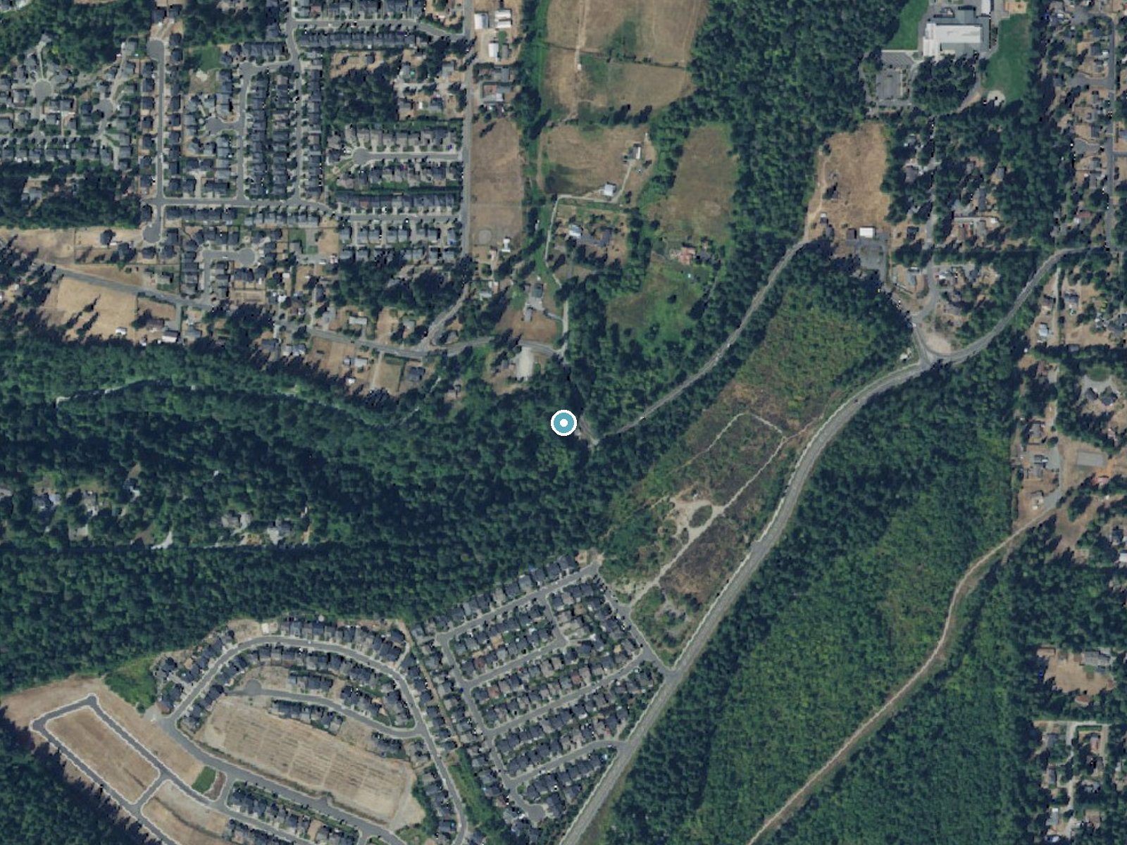 Aerial photo of the same ground around Victor Falls near Tehaleh, Washington, for comparison with the lidar view