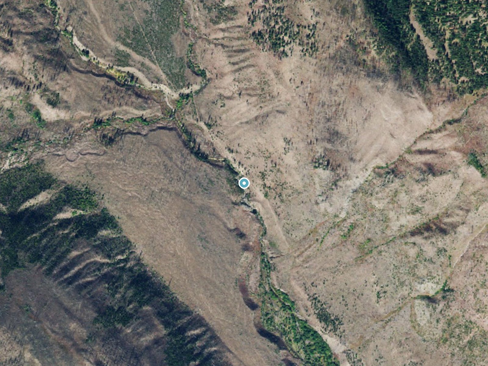 Aerial photo of the same ground around Monture Falls near Ovando, Montana, for comparison with the lidar view
