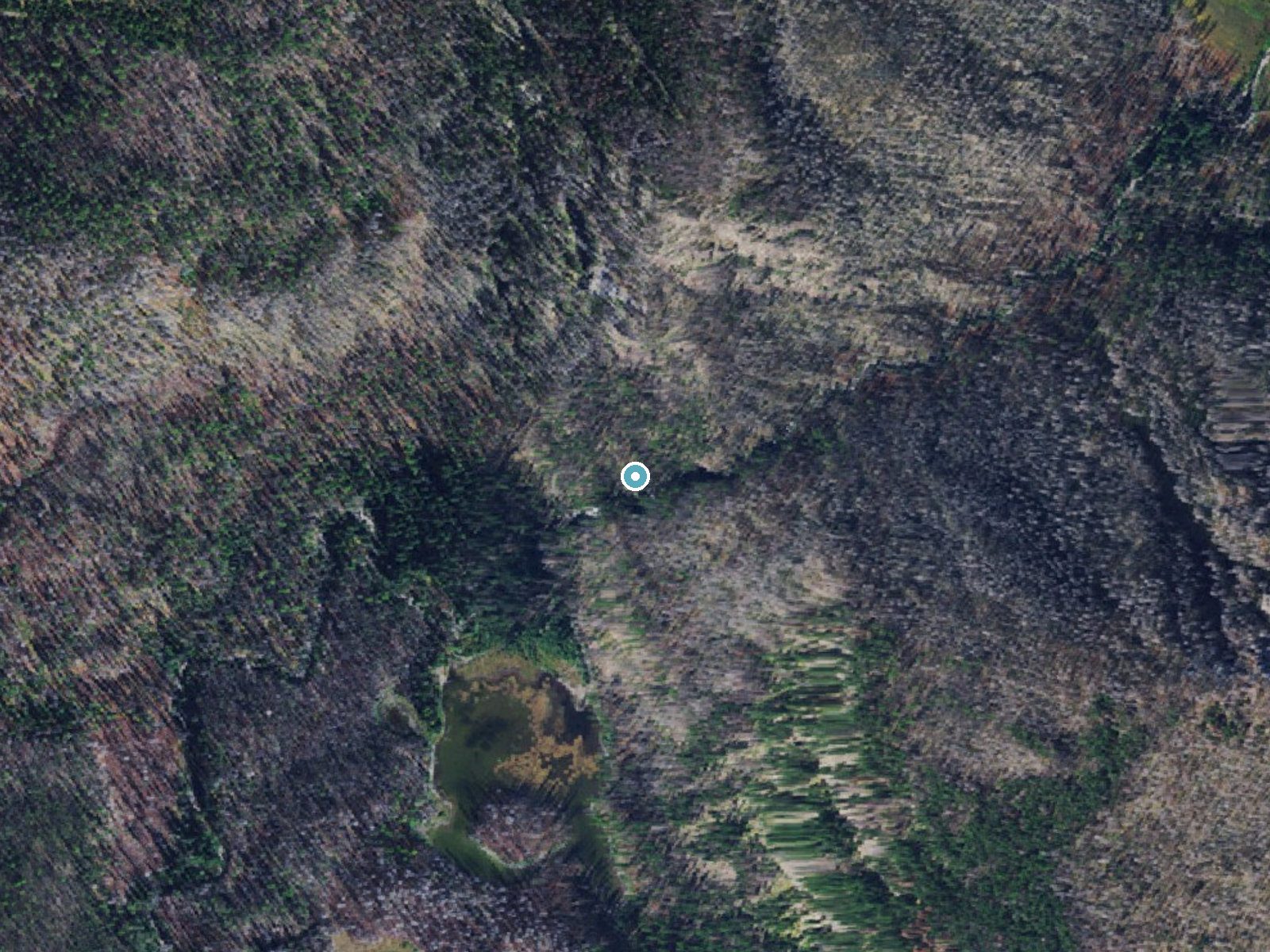 Aerial photo of the same ground around Morrell Falls near Seeley Lake, Montana, for comparison with the lidar view