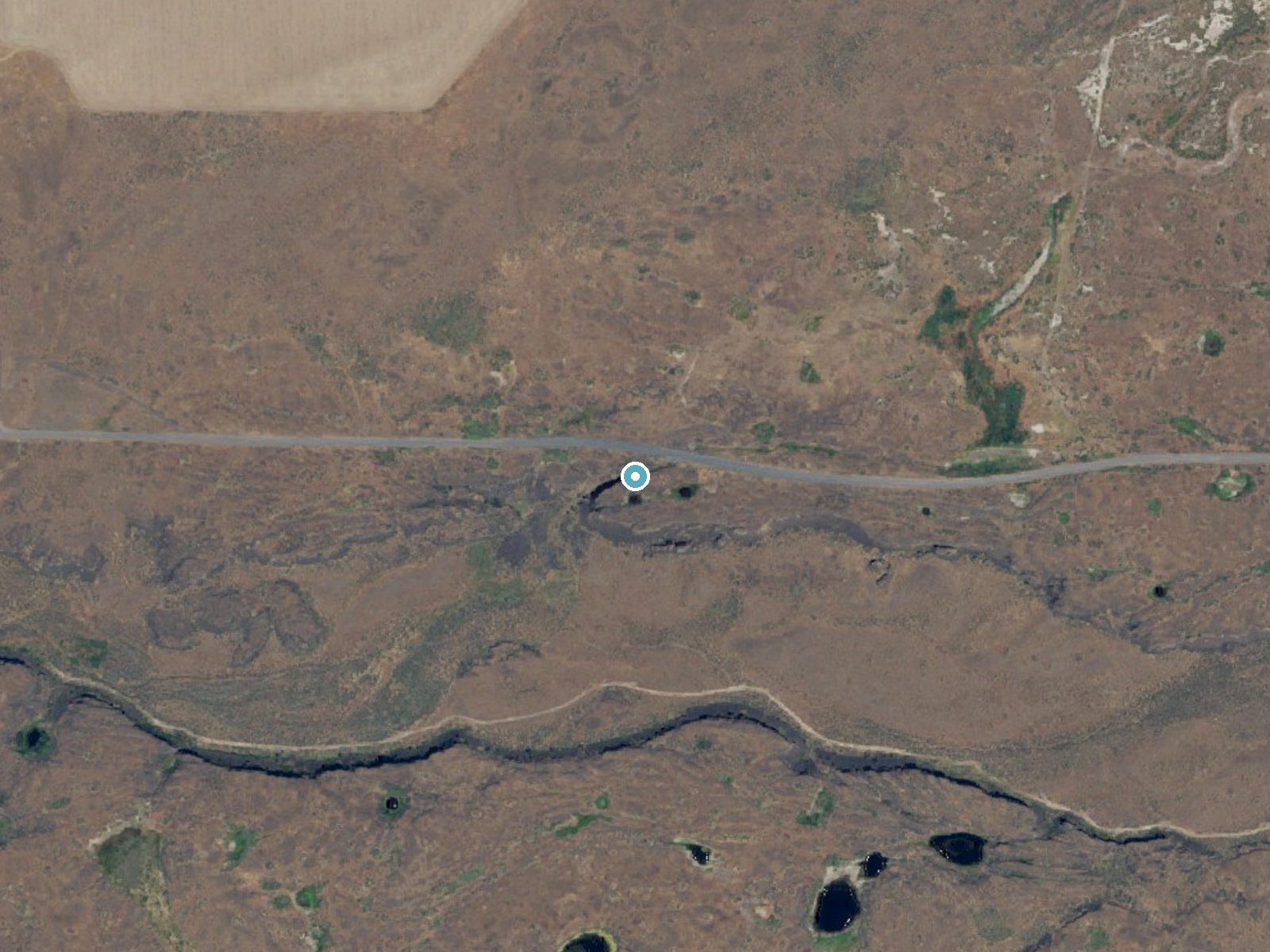 Aerial photo of the same ground around Reiser Falls near Krupp, Washington, for comparison with the lidar view