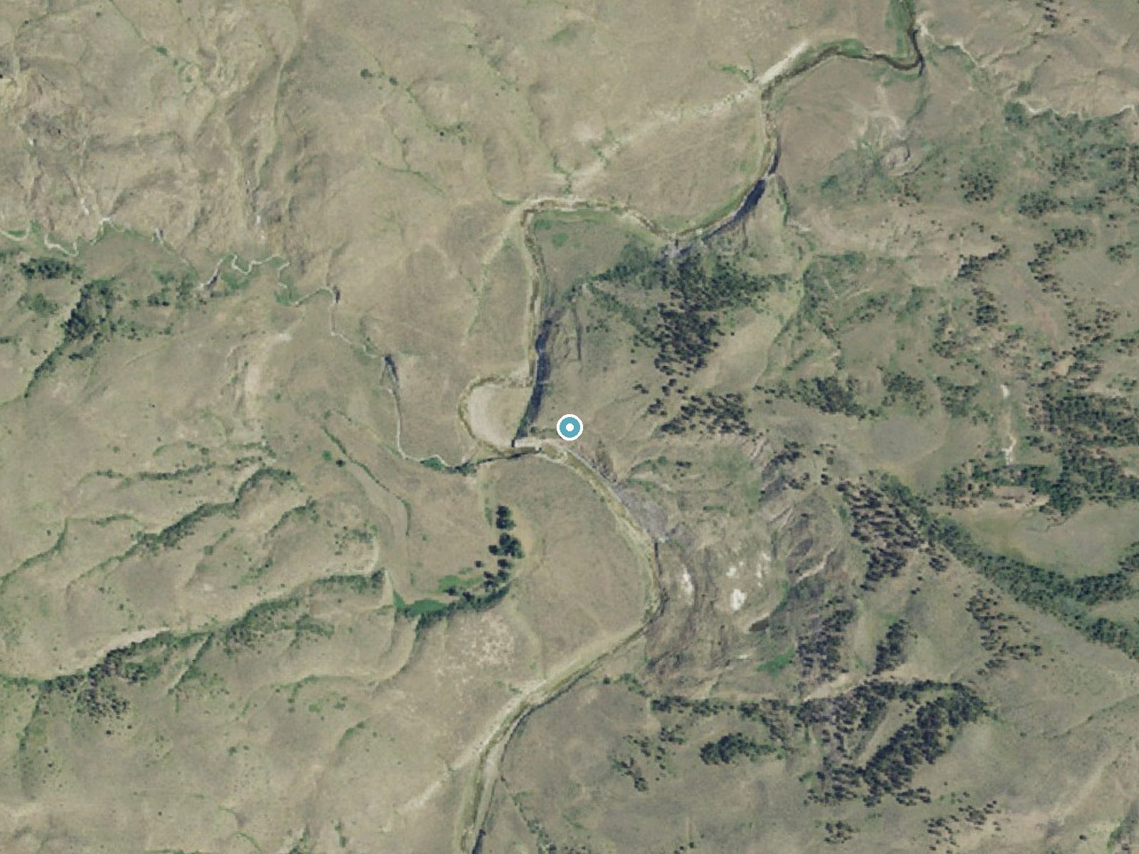 Aerial photo of the same ground around Wolf Creek Falls near Winifred, Montana, for comparison with the lidar view