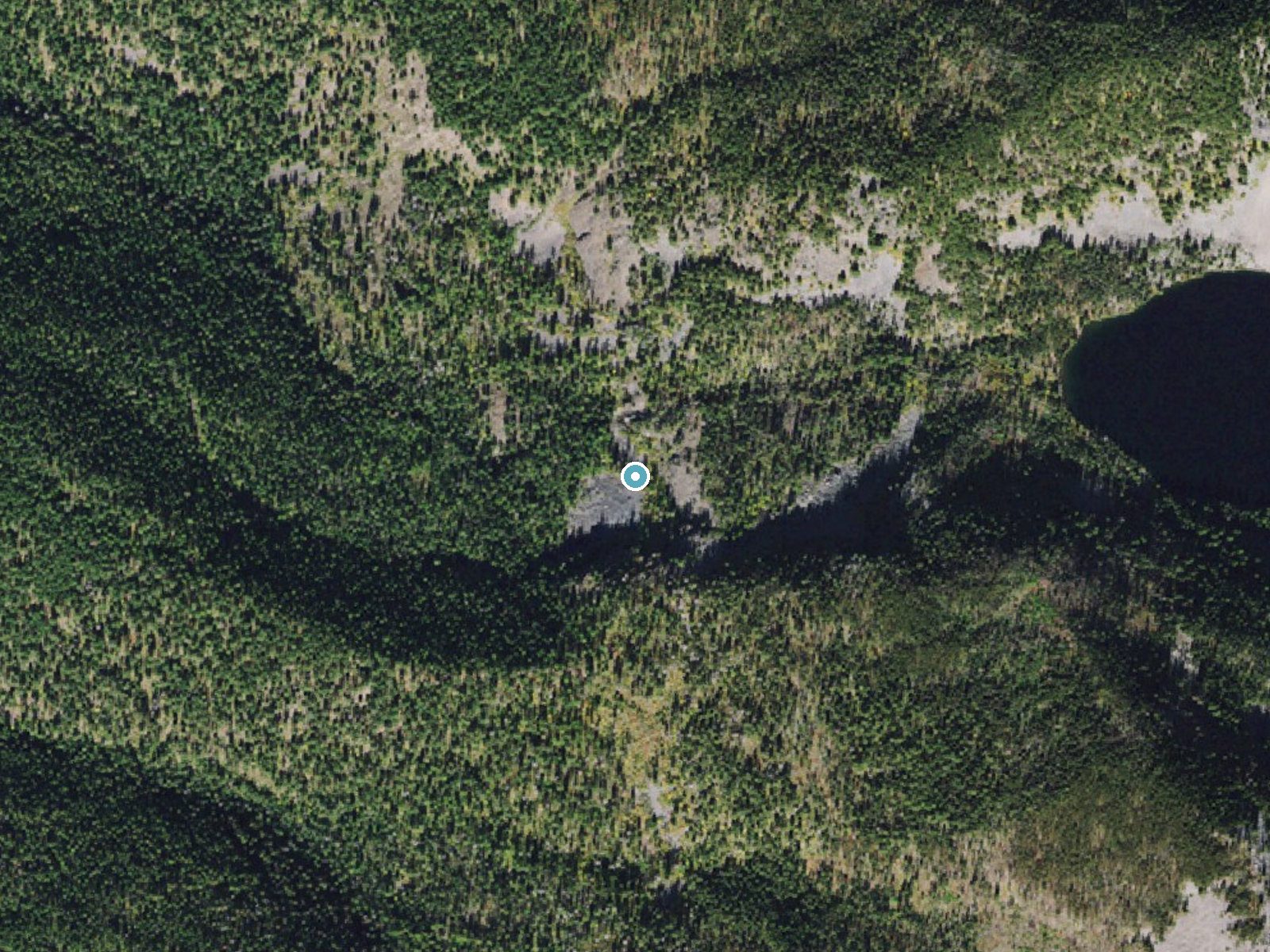 Aerial photo of the same ground around Mud Creek Falls near Pablo, Montana, for comparison with the lidar view