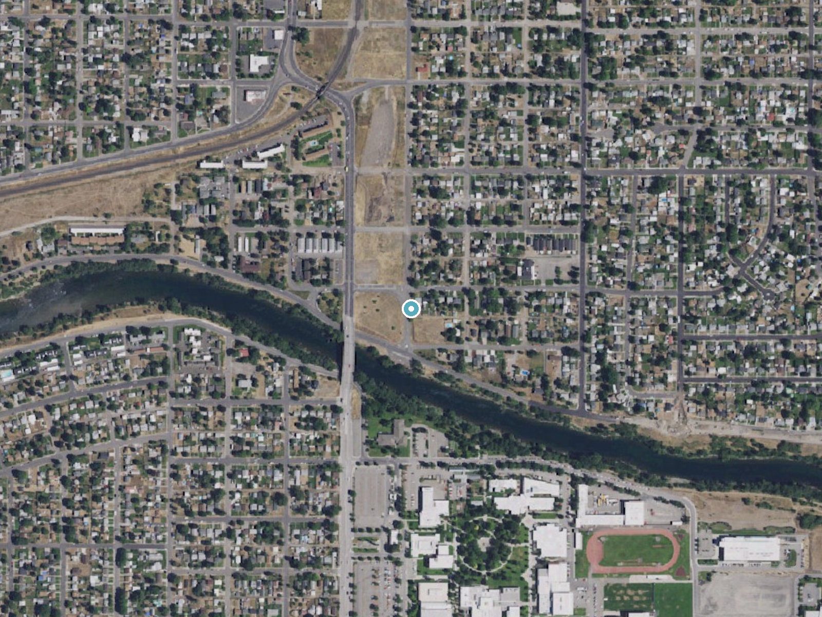 Aerial photo of the same ground around Hn(wa'(we'elshn (historical) near Spokane, Washington, for comparison with the lidar view