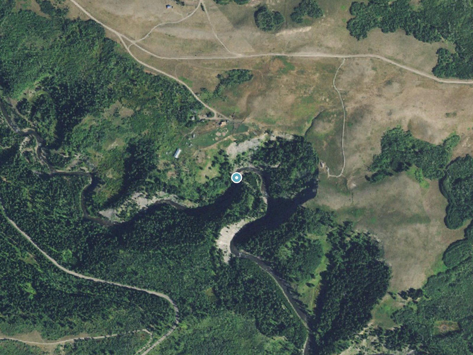 Aerial photo of the same ground around Two Medicine Falls near East Glacier Park Village, Montana, for comparison with the lidar view