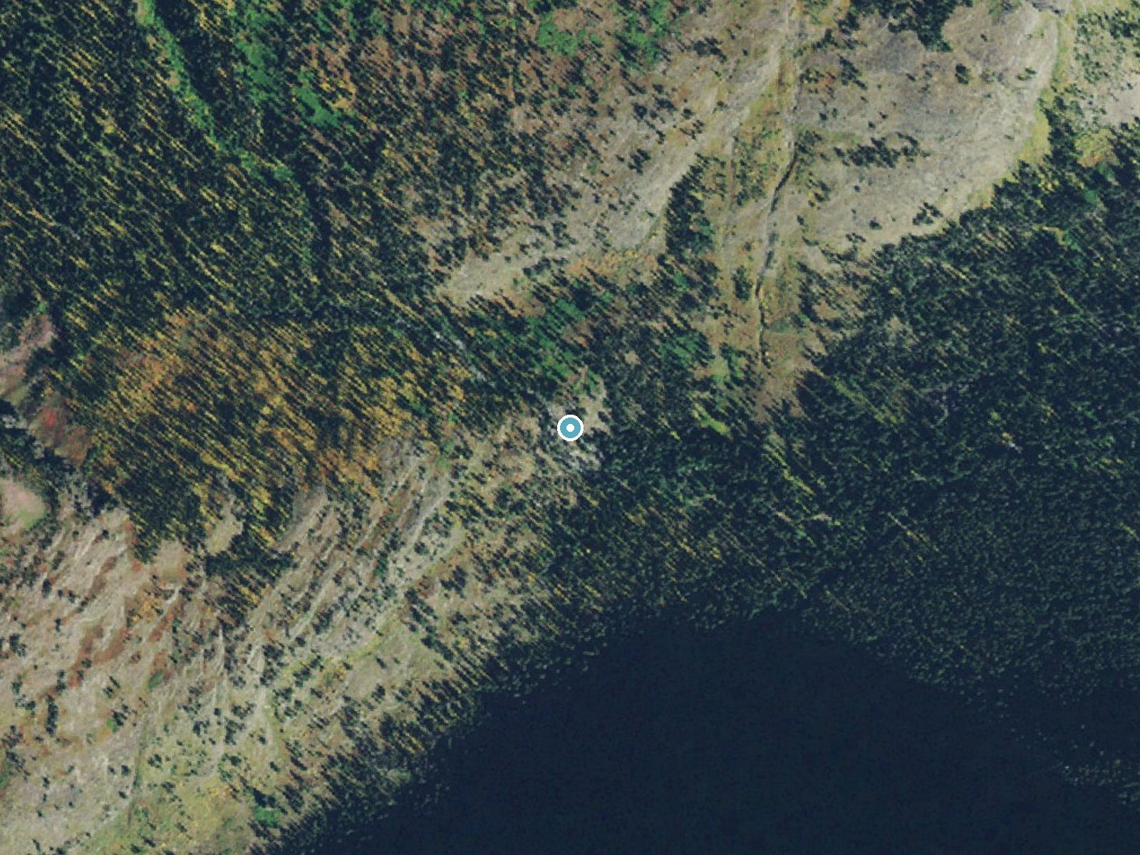 Aerial photo of the same ground around Twin Falls near East Glacier Park Village, Montana, for comparison with the lidar view