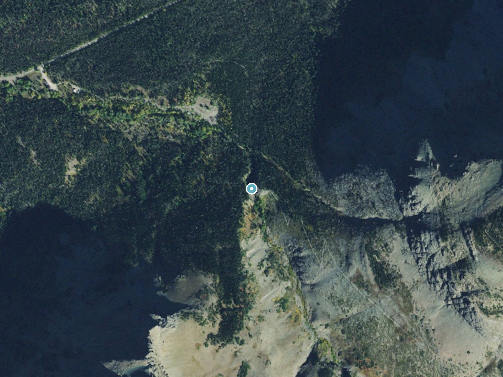Aerial photo of the same ground around Appistoki Falls near East Glacier Park Village, Montana, for comparison with the lidar view